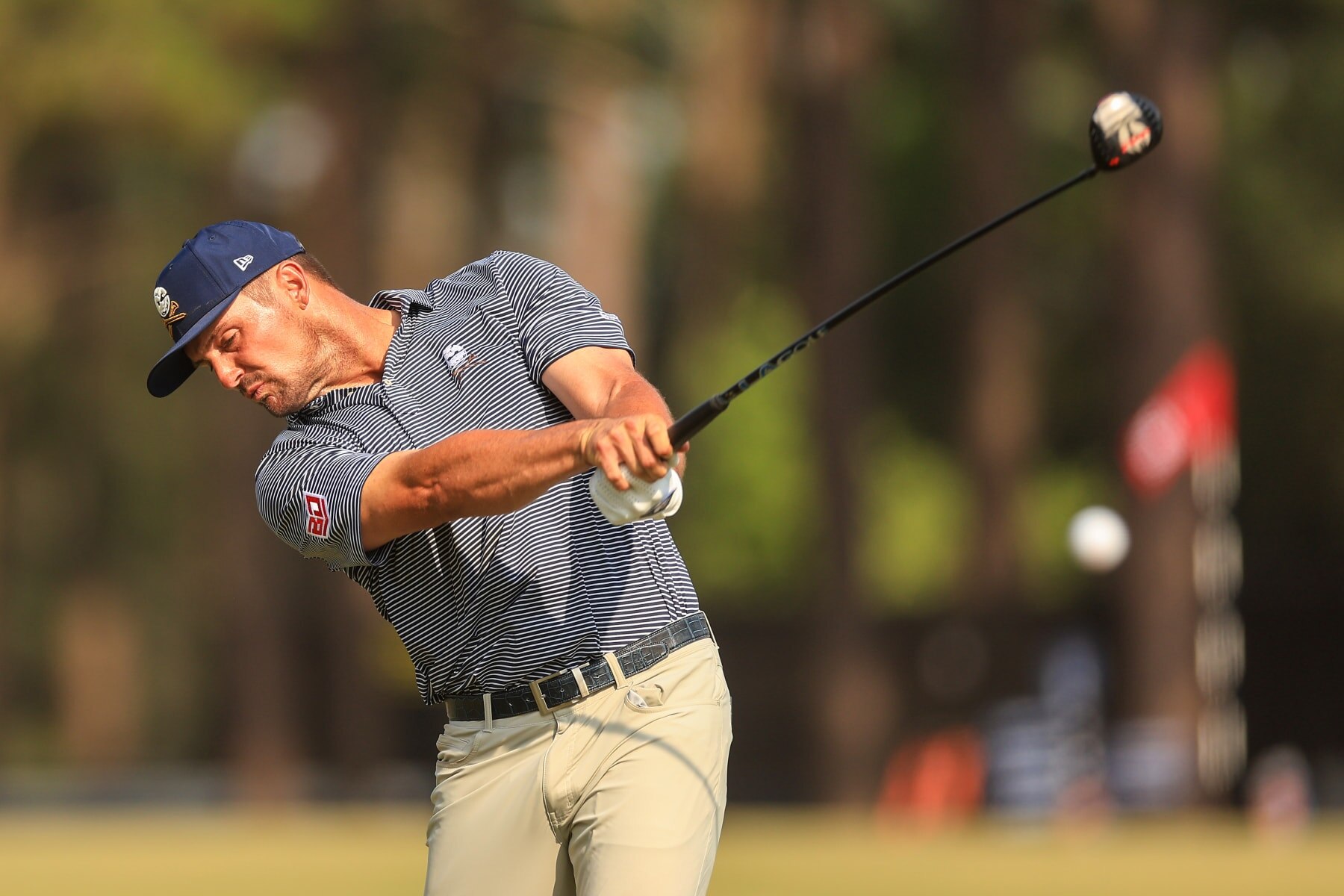 PINEHURST, NORTH CAROLINA - JUNE 16: Bryson DeChambeau of the United States hits his shot from the 13th tee during the final round of the 124th U.S. Open at Pinehurst Resort on June 16, 2024 in Pinehurst, North Carolina. (Photo by Sean M. Haffey/Getty Images)