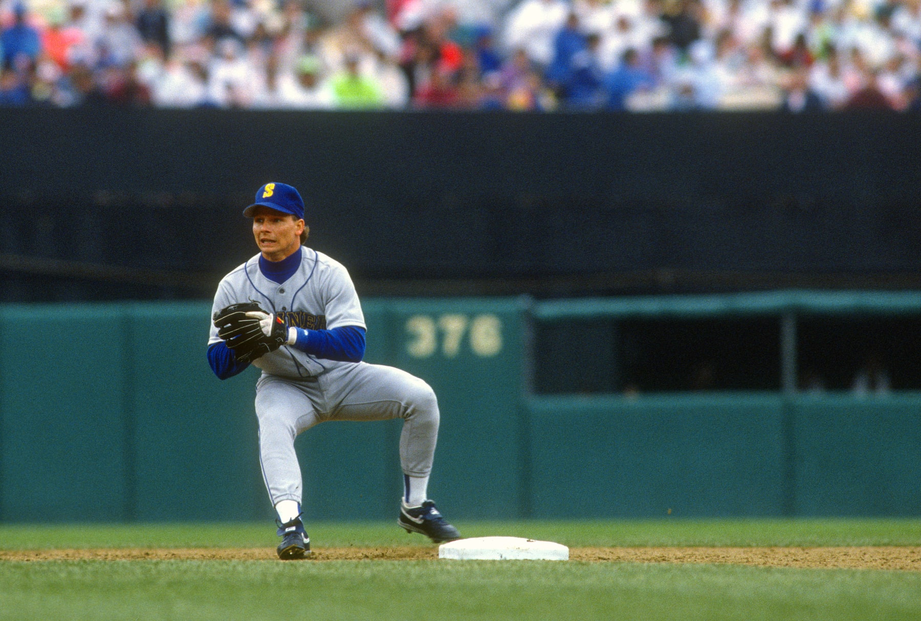 BALTIMORE, MD - CIRCA 1990: Mike Brumley #7 of the Seattle Mariners in action against the Baltimore Orioles during a Major League Baseball game circa 1990 at Memorial Stadium in Baltimore, Maryland. Brumley played for the Mariners in 1990. (Photo by Focus on Sport/Getty Images)