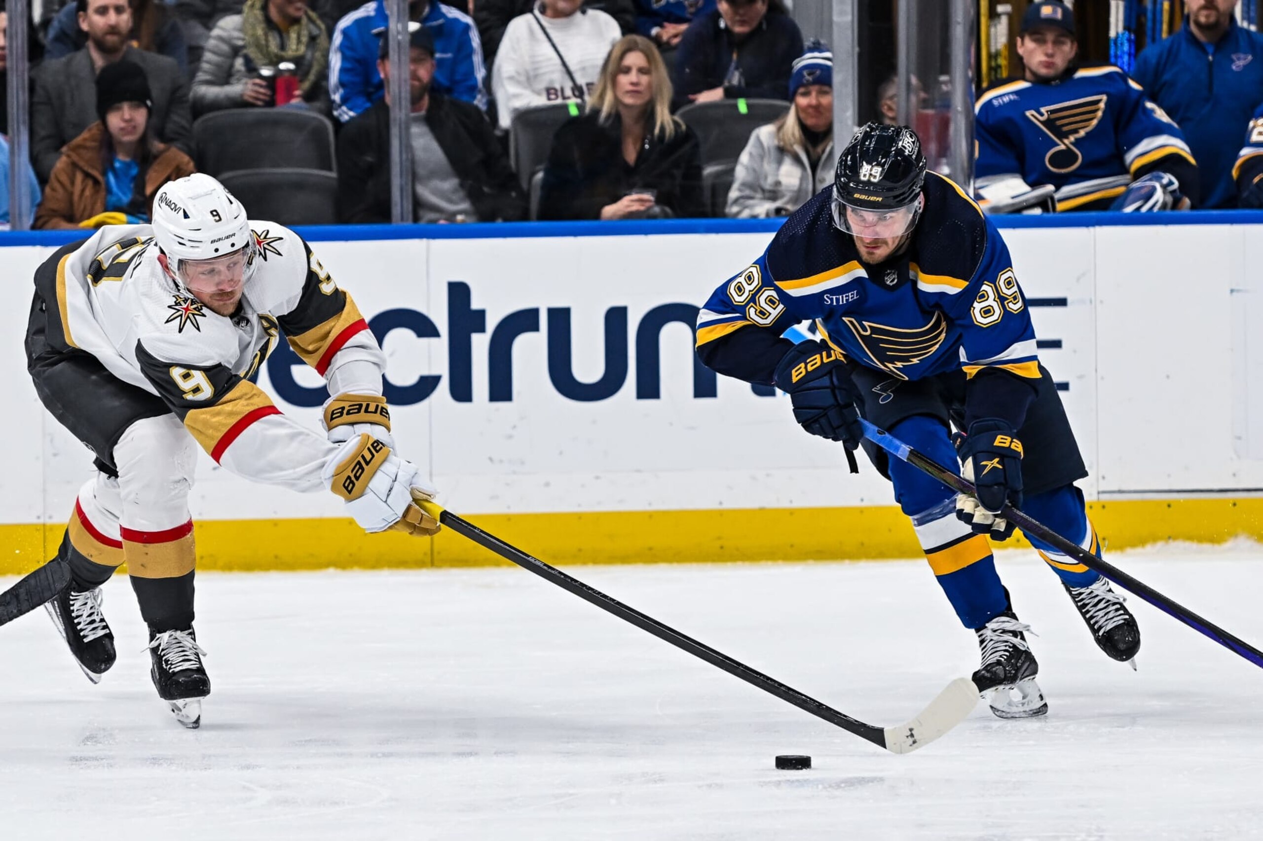 ST. LOUIS, MO - March 25: Vegas Golden Knights center Jack Eichel (9) and St. Louis Blues left wing Pavel Buchnevich (89) both try to gain control over the puck during a regular season game between the Vegas Golden Knights and the St. Louis Blues on March 25, 2024, at the Enterprise Center in St. Louis MO (Photo by Rick Ulreich/Icon Sportswire via Getty Images) ST. LOUIS, MO - March 25: Vegas Golden Knights center Jack Eichel (9) and St. Louis Blues left wing Pavel Buchnevich (89) both try to gain control over the puck during a regular season game between the Vegas Golden Knights and the St. Louis Blues on March 25, 2024, at the Enterprise Center in St. Louis MO (Photo by Rick Ulreich/Icon Sportswire via Getty Images)