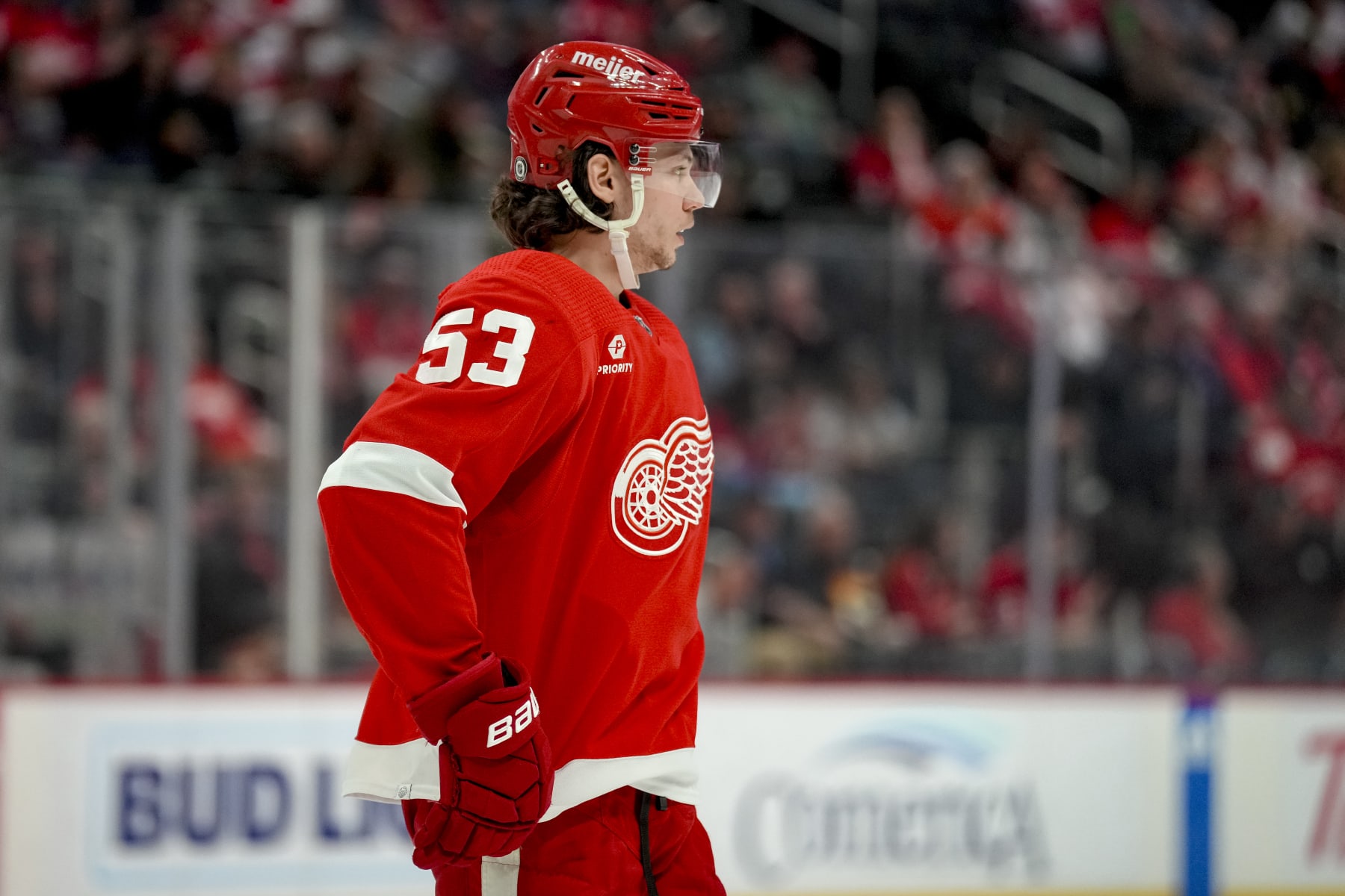 DETROIT, MICHIGAN - APRIL 09: Moritz Seider #53 of the Detroit Red Wings looks on against the Washington Capitals at Little Caesars Arena on April 09, 2024 in Detroit, Michigan. (Photo by Nic Antaya/Getty Images)