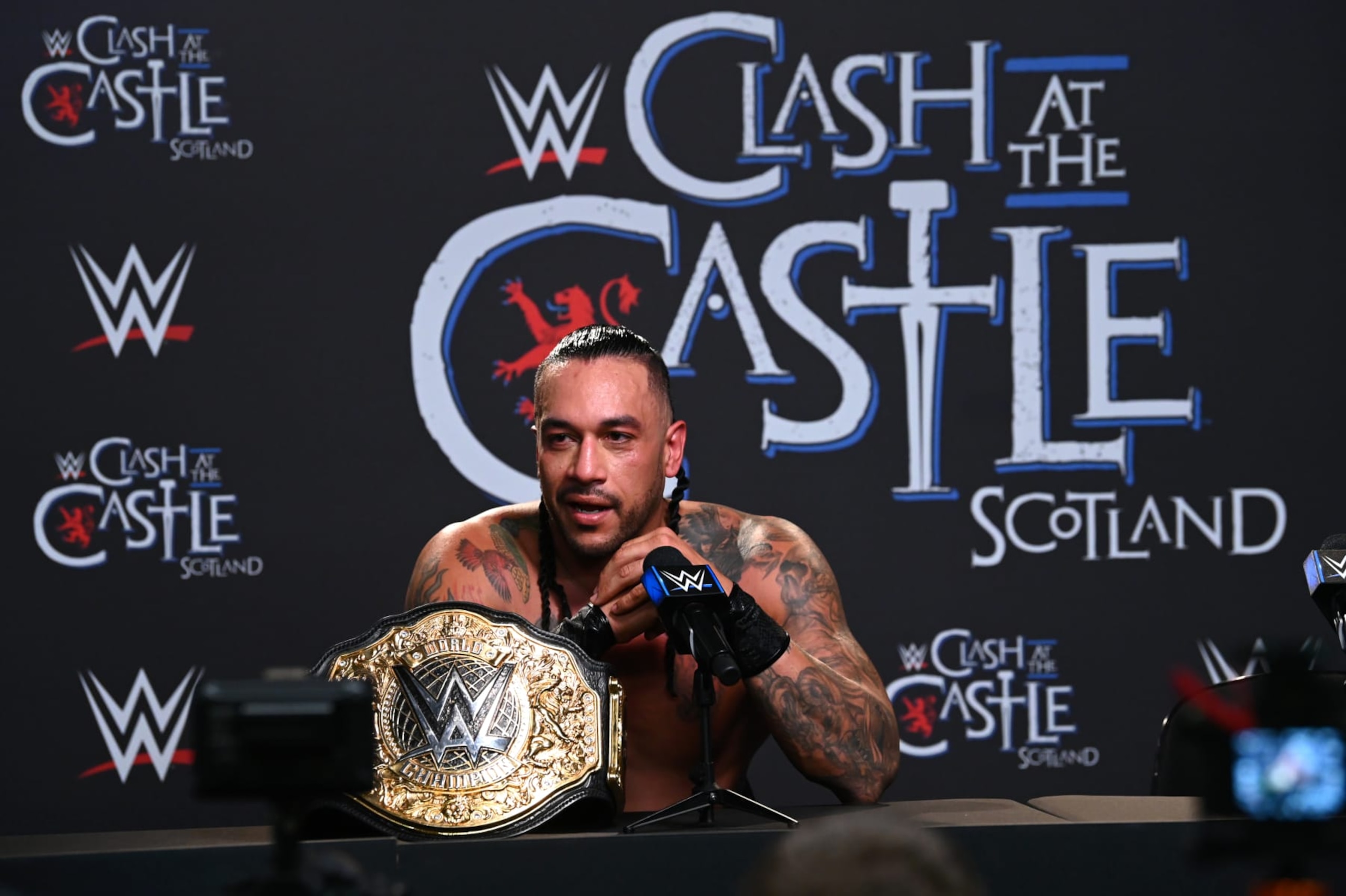 GLASGOW, SCOTLAND - JUNE 15: WWE World Heavyweight Champion Damian Priest speaks during a post event press conference following WWE's Clash at the Castle, Premium Live Event at The OVO Hydro on June 15, 2024 in Glasgow, Scotland.  (Photo by WWE/Getty Images)