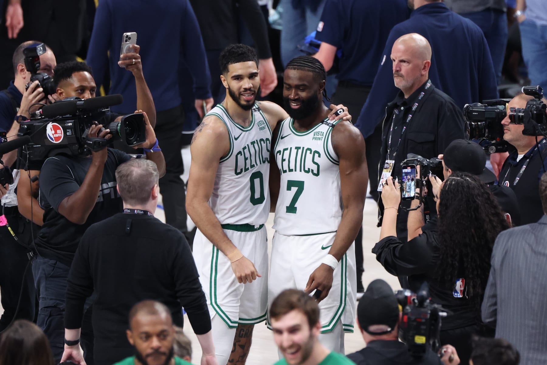 DALLAS, TX - JUNE 12: Jaylen Brown #7 and Jayson Tatum #0 of the Boston Celtics embrace after the game against the Dallas Mavericks during Game 3 of the 2024 NBA Finals on June 12, 2024 at the American Airlines Center in Dallas, Texas. NOTE TO USER: User expressly acknowledges and agrees that, by downloading and or using this photograph, User is consenting to the terms and conditions of the Getty Images License Agreement. Mandatory Copyright Notice: Copyright 2024 NBAE (Photo by Joe Murphy/NBAE via Getty Images)