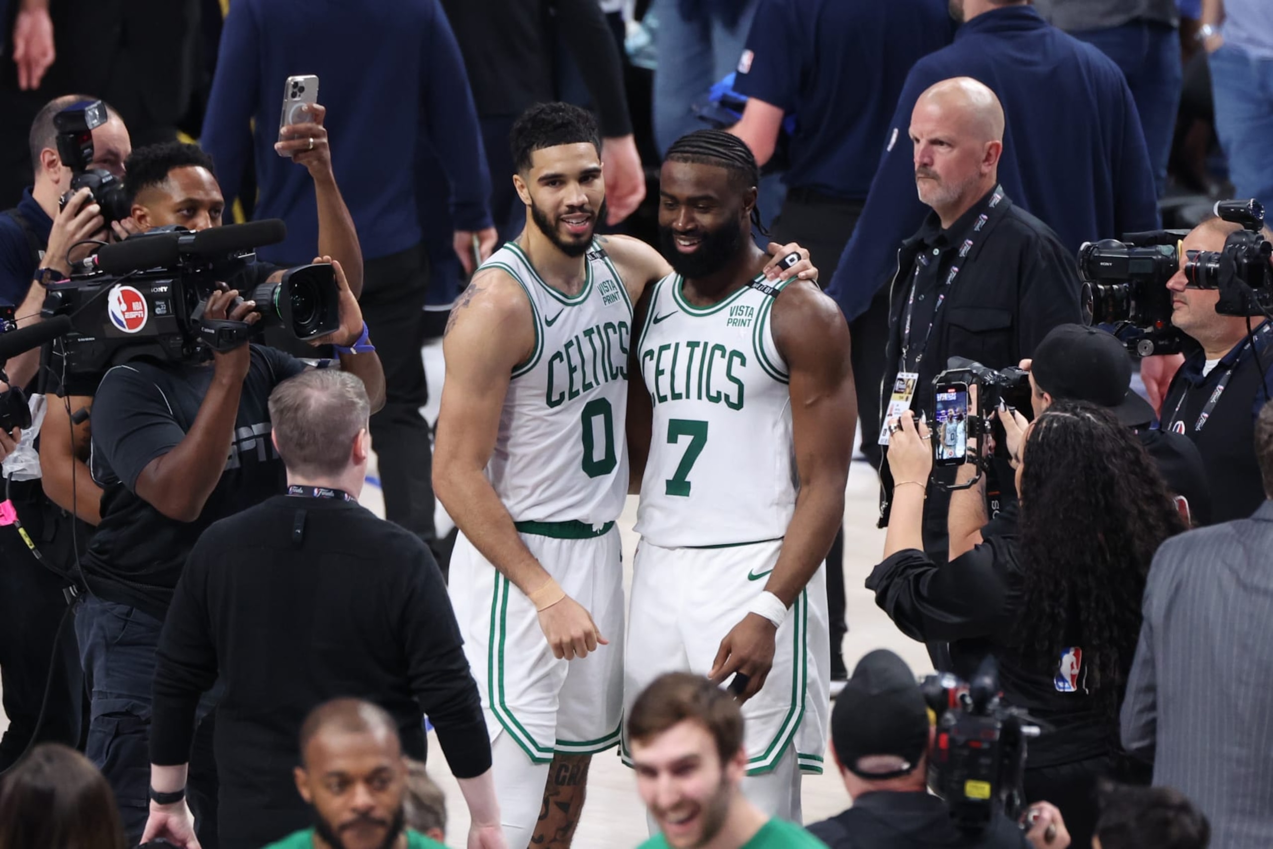 DALLAS, TX - JUNE 12: Jaylen Brown #7 and Jayson Tatum #0 of the Boston Celtics embrace after the game against the Dallas Mavericks during Game 3 of the 2024 NBA Finals on June 12, 2024 at the American Airlines Center in Dallas, Texas. NOTE TO USER: User expressly acknowledges and agrees that, by downloading and or using this photograph, User is consenting to the terms and conditions of the Getty Images License Agreement. Mandatory Copyright Notice: Copyright 2024 NBAE (Photo by Joe Murphy/NBAE via Getty Images)