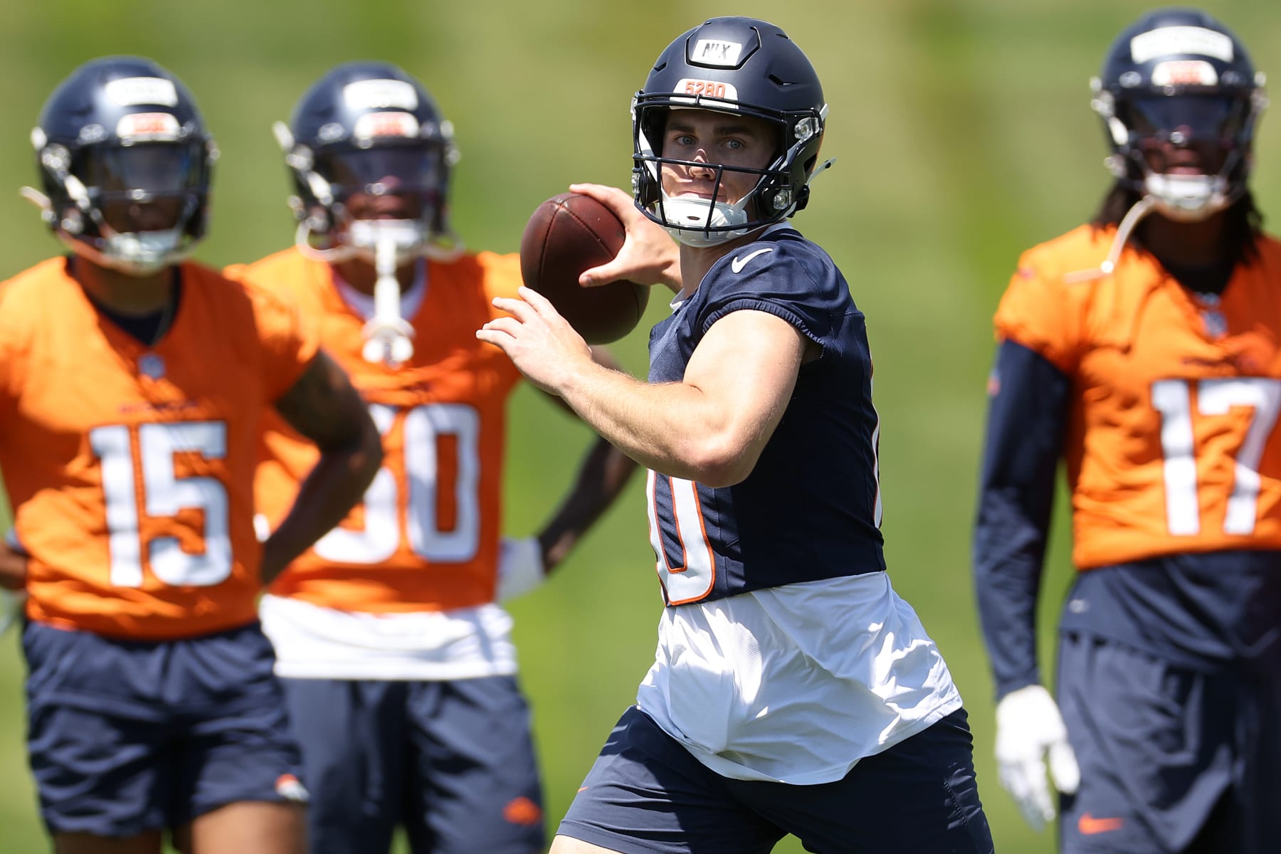 ENGLEWOOD, COLORADO - JUNE 12: Bo Nix #10 of the Denver Broncos throws during Denver Broncos OTA Offseason Workouts at Centura Health Training Center on June 12, 2024 in Englewood, Colorado. (Photo by Matthew Stockman/Getty Images)
