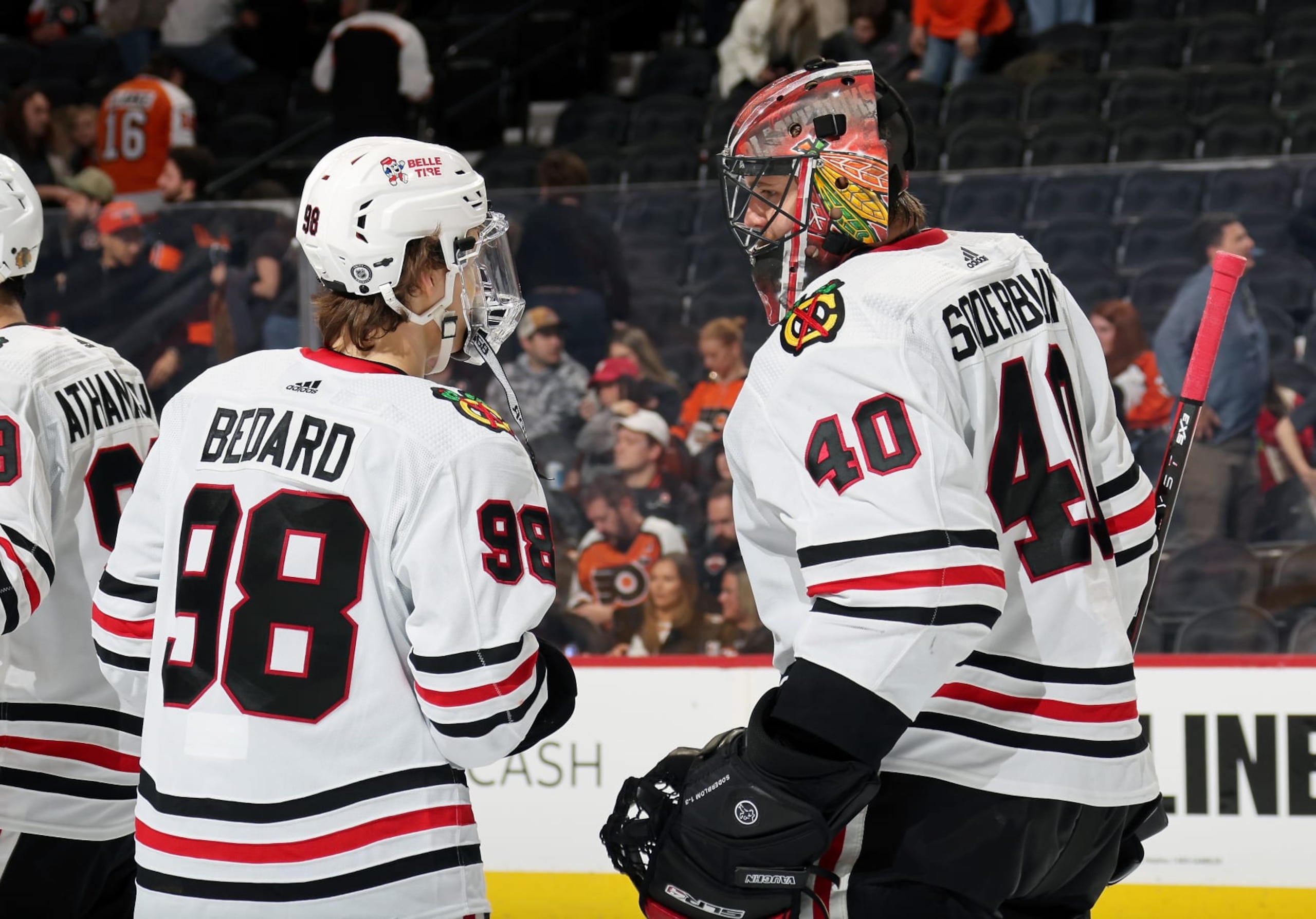 PHILADELPHIA, PENNSYLVANIA - MARCH 30: Arvid Soderblom #40 of the Chicago Blackhawks celebrates with Connor Bedard #98 after defeating the Philadelphia Flyers 5-1 at the Wells Fargo Center on March 30, 2024 in Philadelphia, Pennsylvania. (Photo by Len Redkoles/NHLI via Getty Images) PHILADELPHIA, PENNSYLVANIA - MARCH 30: Arvid Soderblom #40 of the Chicago Blackhawks celebrates with Connor Bedard #98 after defeating the Philadelphia Flyers 5-1 at the Wells Fargo Center on March 30, 2024 in Philadelphia, Pennsylvania. (Photo by Len Redkoles/NHLI via Getty Images)