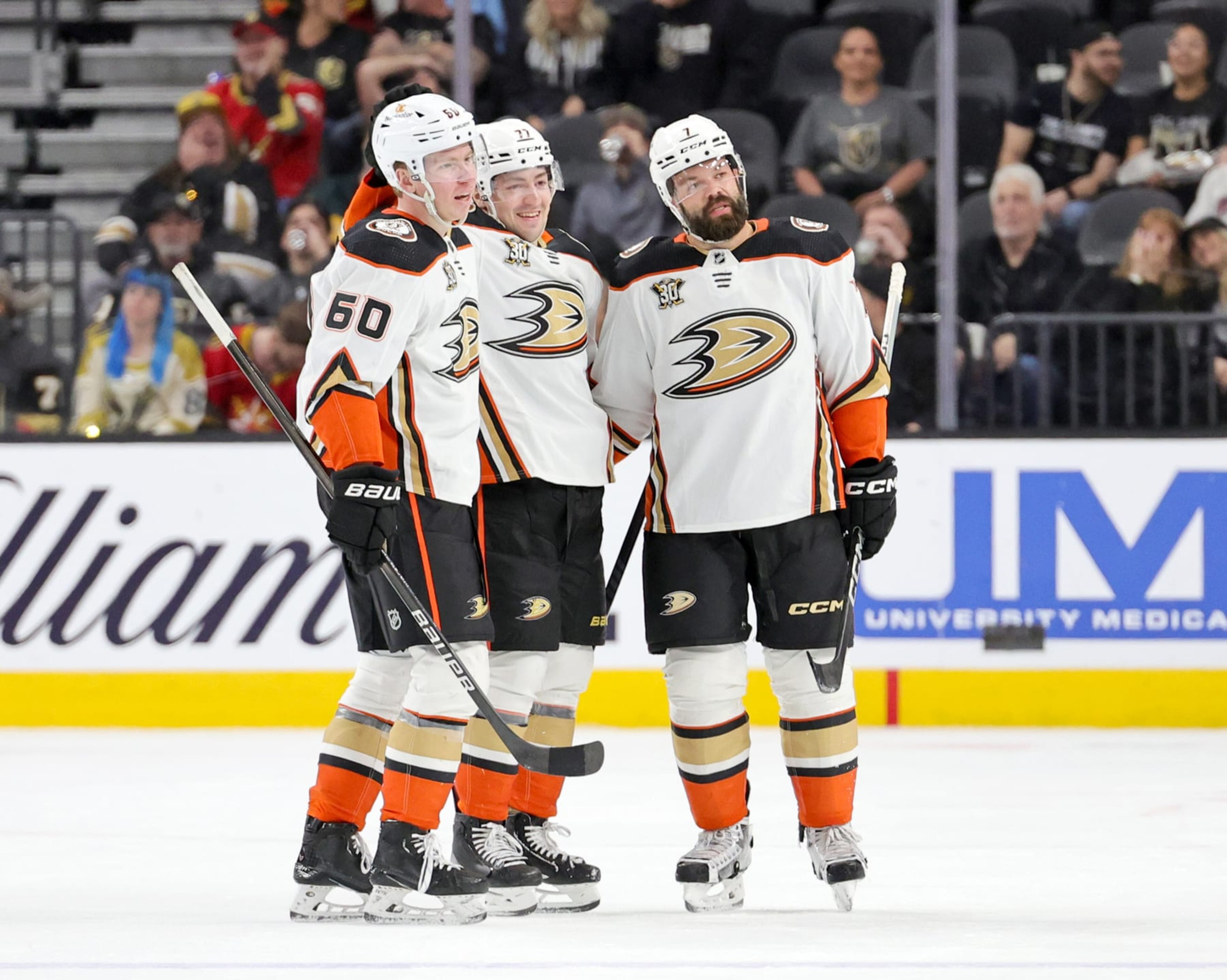 LAS VEGAS, NEVADA - APRIL 18: Jackson LaCombe #60, Frank Vatrano #77 and Radko Gudas #7 of the Anaheim Ducks celebrate after Vatrano scored a short-handed empty-net goal, the second of his two third-period goals, and his third goal of the game, against the Vegas Golden Knights during their game at T-Mobile Arena on April 18, 2024 in Las Vegas, Nevada. The Ducks defeated the Golden Knights 4-1. (Photo by Ethan Miller/Getty Images) LAS VEGAS, NEVADA - APRIL 18: Jackson LaCombe #60, Frank Vatrano #77 and Radko Gudas #7 of the Anaheim Ducks celebrate after Vatrano scored a short-handed empty-net goal, the second of his two third-period goals, and his third goal of the game, against the Vegas Golden Knights during their game at T-Mobile Arena on April 18, 2024 in Las Vegas, Nevada. The Ducks defeated the Golden Knights 4-1. (Photo by Ethan Miller/Getty Images)