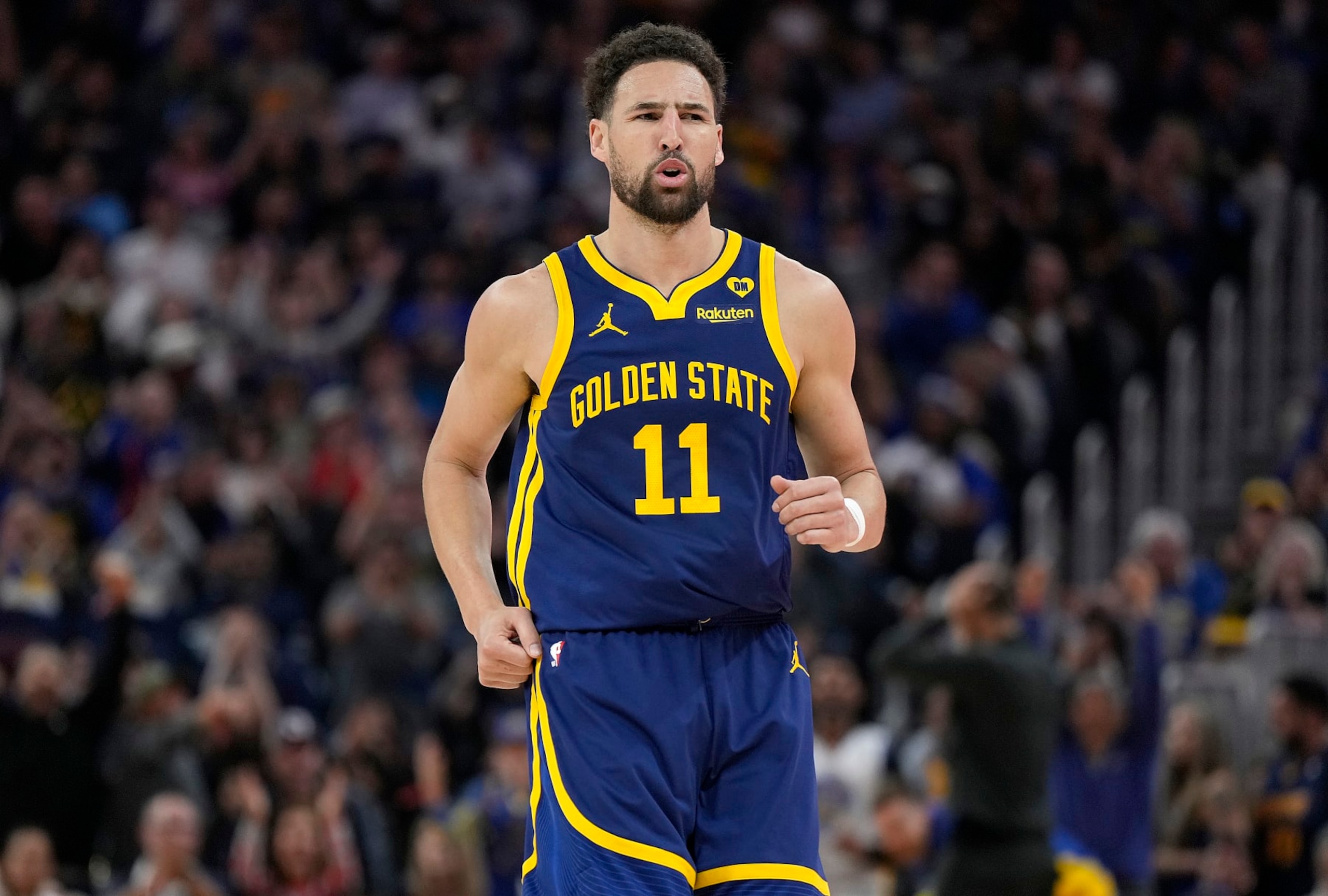 SAN FRANCISCO, CALIFORNIA - APRIL 07: Klay Thompson #11 of the Golden State Warriors reacts after making a three-point shot against the Utah Jazz during first half of an NBA basketball game at Chase Center on April 07, 2024 in San Francisco, California. NOTE TO USER: User expressly acknowledges and agrees that, by downloading and or using this photograph, User is consenting to the terms and conditions of the Getty Images License Agreement. (Photo by Thearon W. Henderson/Getty Images)