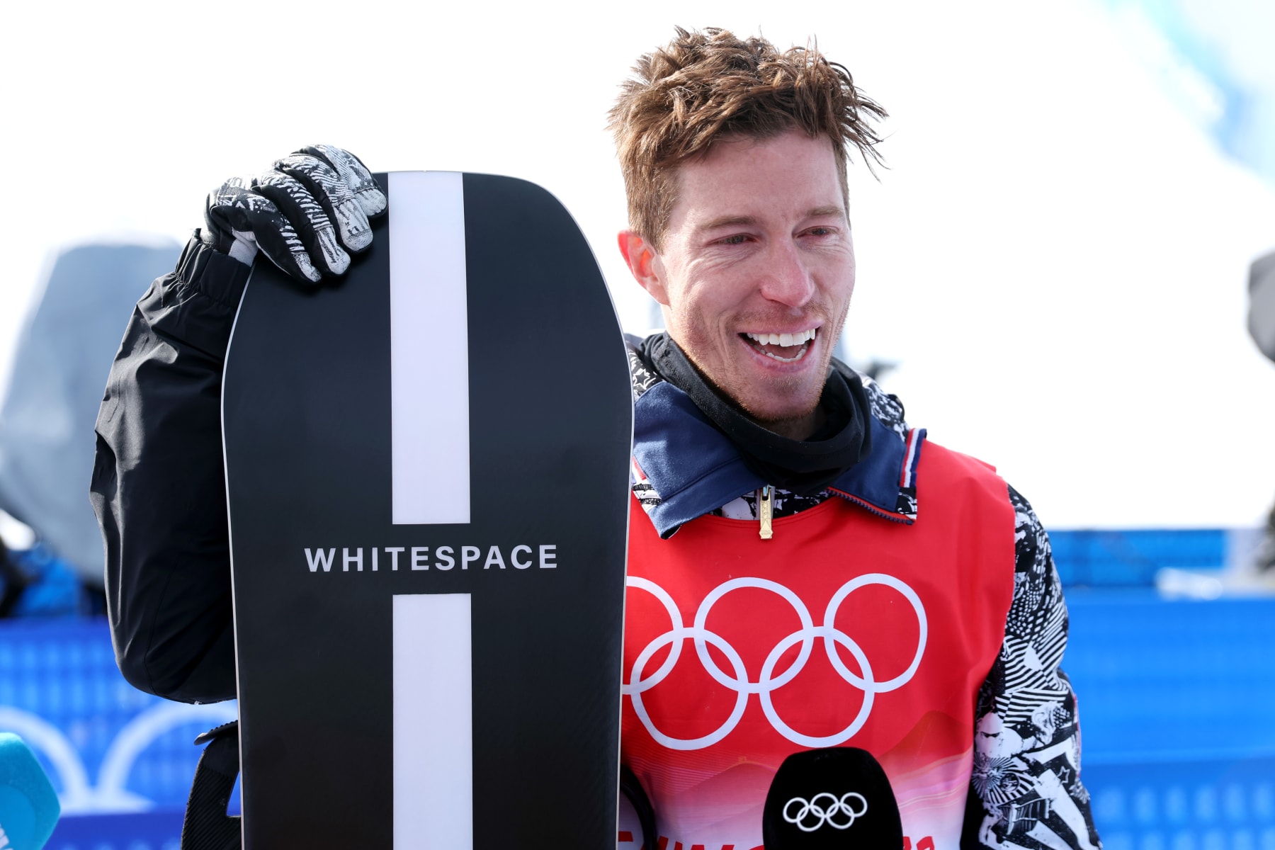 ZHANGJIAKOU, CHINA - FEBRUARY 11: Shaun White of Team United States shows emotion speaking with the press after finishing fourth during the Men's Snowboard Halfpipe Final on day 7 of the Beijing 2022 Winter Olympics at Genting Snow Park on February 11, 2022 in Zhangjiakou, China. White competed in five Winter Olympic Games and had announced Beijing 2022 will be the last one of his career. (Photo by Maddie Meyer/Getty Images)