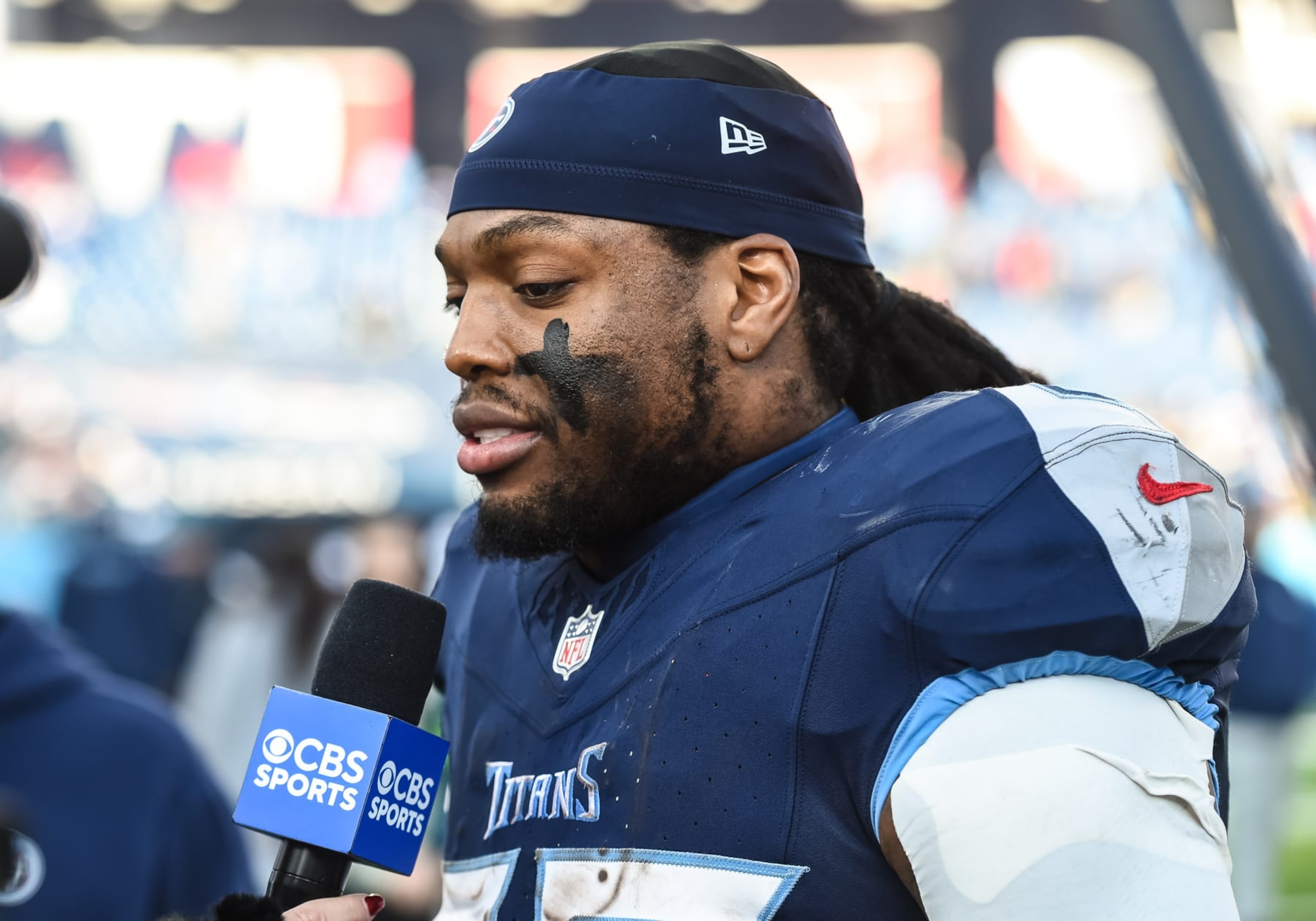 NASHVILLE, TN - JANUARY 07: Tennessee Titans running back Derrick Henry (22) talks with the media during the NFL game between the Tennessee Titans and the Jacksonville Jaguars on January 7, 2024, at Nissan Stadium in Nashville, TN. (Photo by Bryan Lynn/Icon Sportswire via Getty Images) NASHVILLE, TN - JANUARY 07: Tennessee Titans running back Derrick Henry (22) talks with the media during the NFL game between the Tennessee Titans and the Jacksonville Jaguars on January 7, 2024, at Nissan Stadium in Nashville, TN. (Photo by Bryan Lynn/Icon Sportswire via Getty Images)