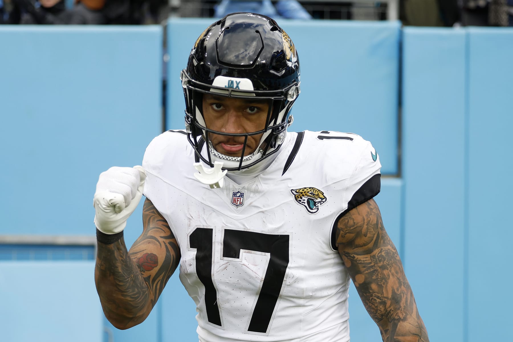 NASHVILLE, TENNESSEE - JANUARY 07: Evan Engram #17 of the Jacksonville Jaguars reacts after a touchdown pass during the fourth quarter against the Tennessee Titans at Nissan Stadium on January 07, 2024 in Nashville, Tennessee. (Photo by Wesley Hitt/Getty Images)