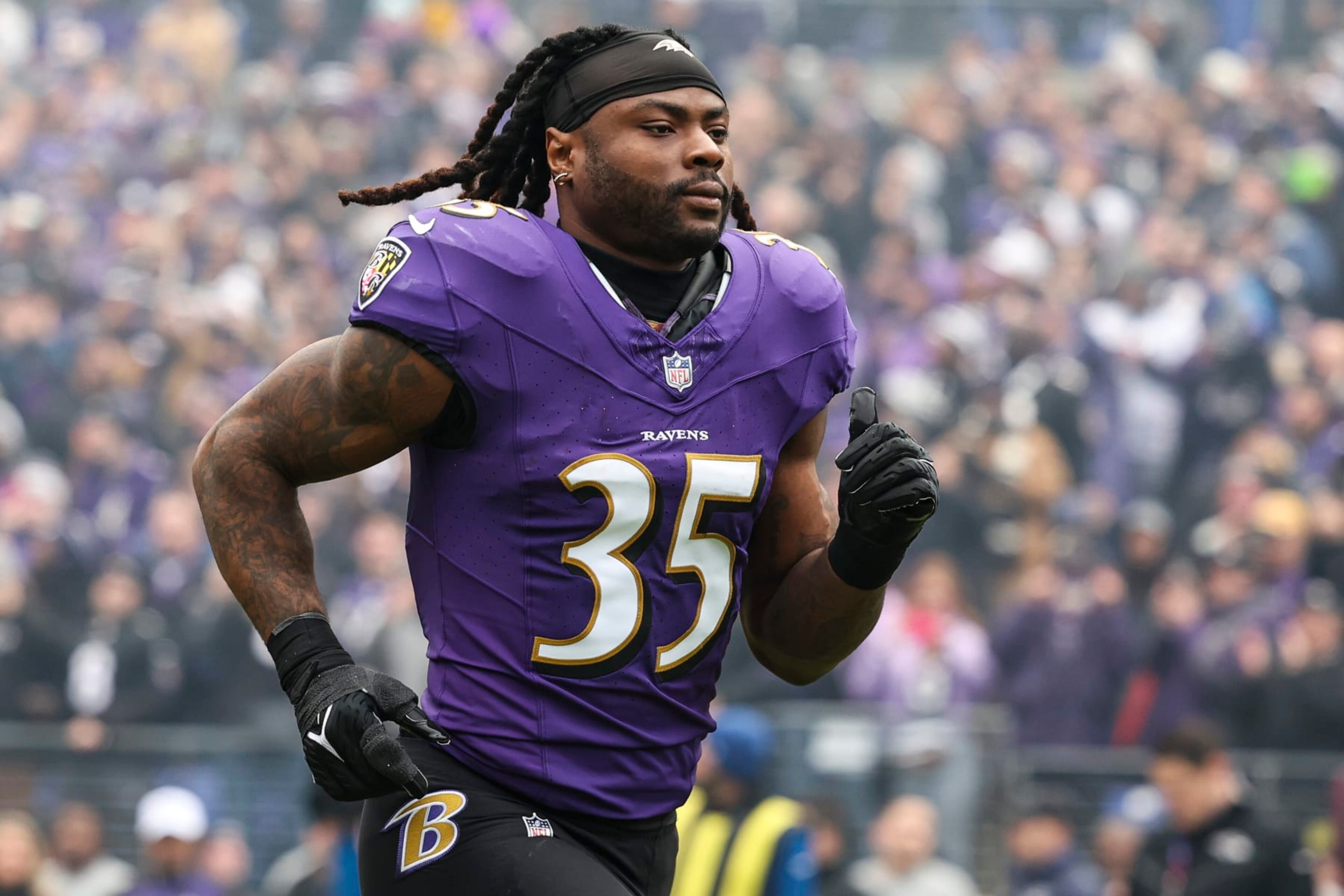 BALTIMORE, MD - JANUARY 28: Gus Edwards #35 of the Baltimore Ravens runs out of the tunnel prior to the AFC Championship NFL football game against the Kansas City Chiefs at M&T Bank Stadium on January 28, 2024 in Baltimore, Maryland. (Photo by Perry Knotts/Getty Images) BALTIMORE, MD - JANUARY 28: Gus Edwards #35 of the Baltimore Ravens runs out of the tunnel prior to the AFC Championship NFL football game against the Kansas City Chiefs at M&T Bank Stadium on January 28, 2024 in Baltimore, Maryland. (Photo by Perry Knotts/Getty Images)
