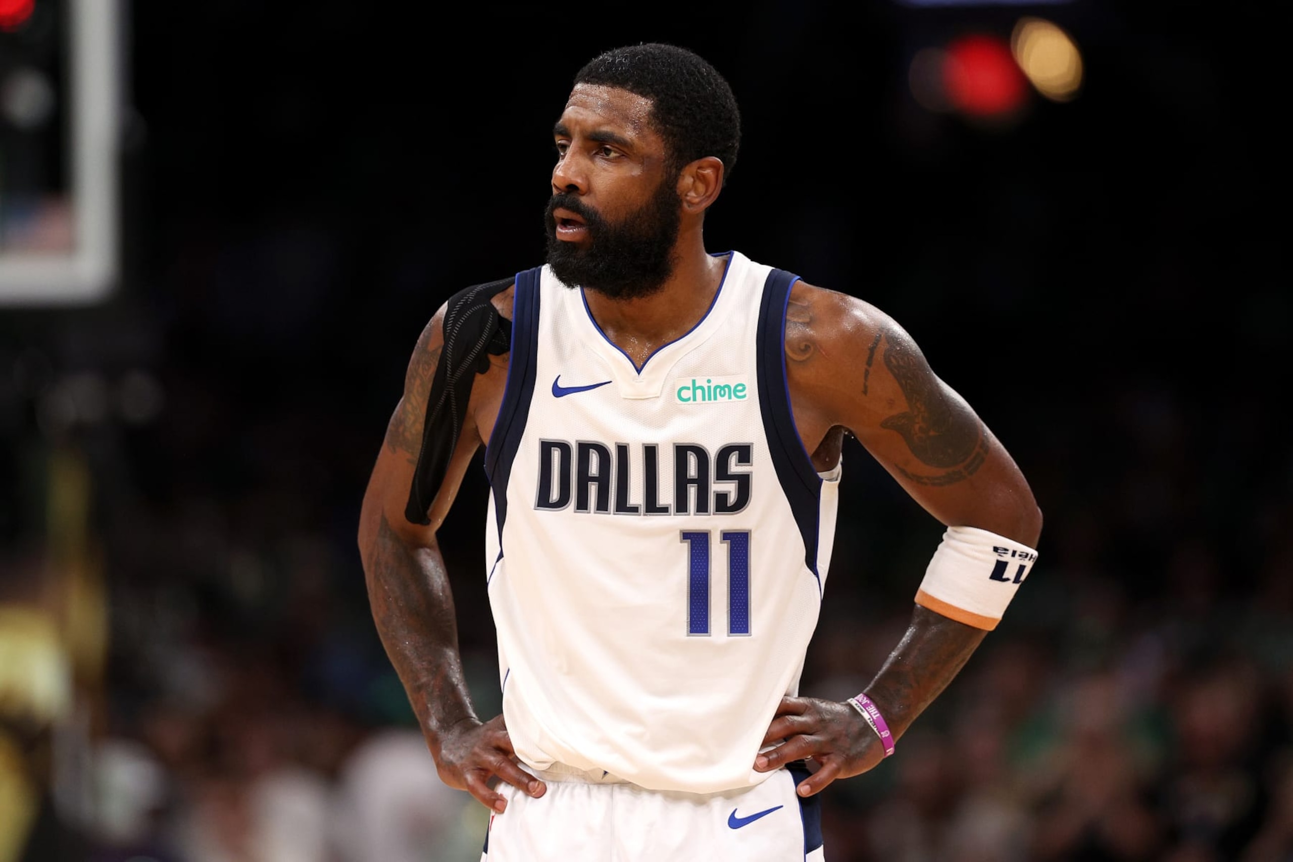 BOSTON, MASSACHUSETTS - JUNE 17: Kyrie Irving #11 of the Dallas Mavericks looks on during the second quarter of Game Five of the 2024 NBA Finals against the Boston Celtics at TD Garden on June 17, 2024 in Boston, Massachusetts. NOTE TO USER: User expressly acknowledges and agrees that, by downloading and or using this photograph, User is consenting to the terms and conditions of the Getty Images License Agreement. (Photo by Elsa/Getty Images)