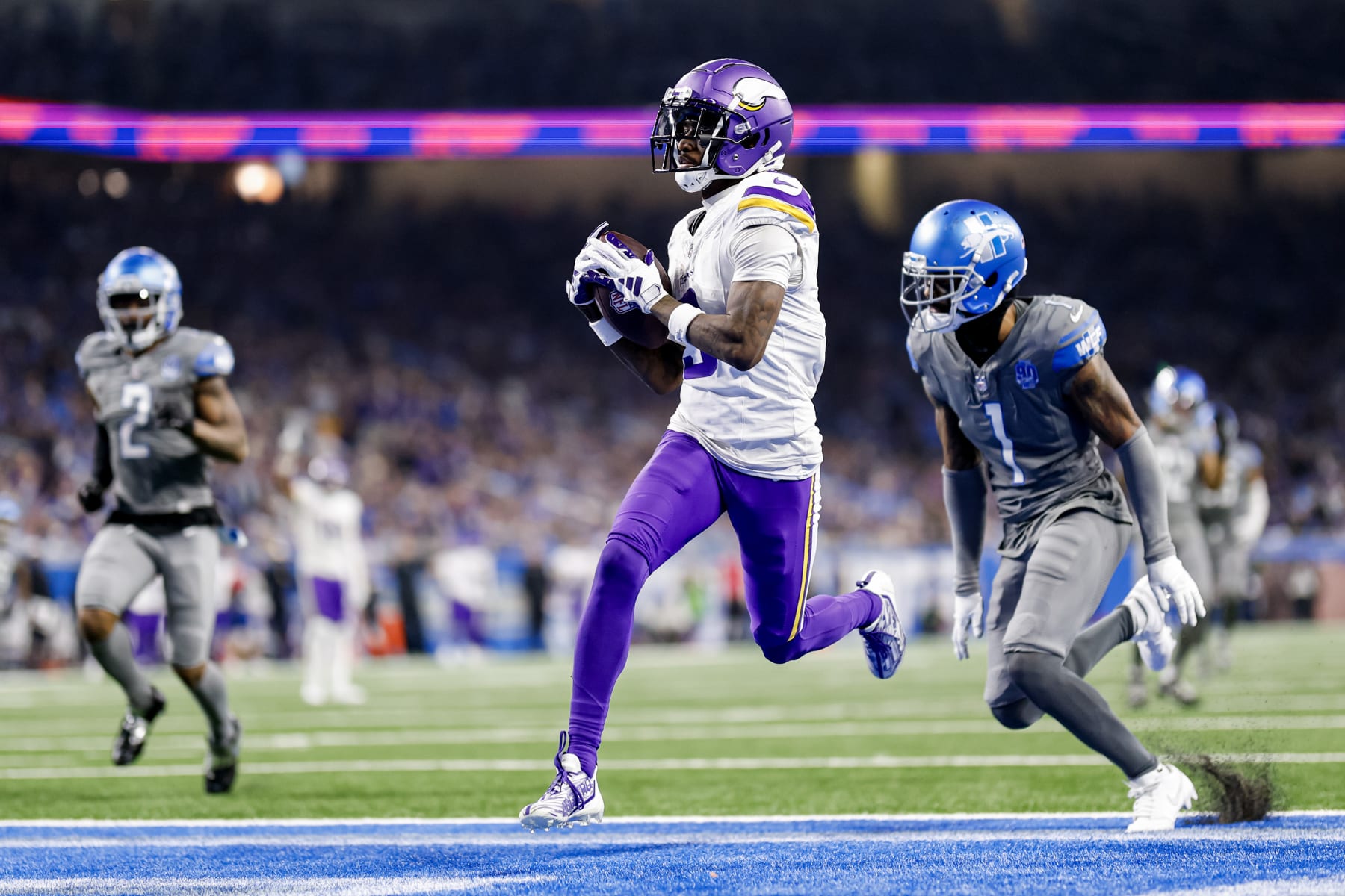DETROIT, MICHIGAN - JANUARY 07: Jordan Addison #3 of the Minnesota Vikings catches a touchdown pass during the second half of a game against the Detroit Lions at Ford Field on January 07, 2024 in Detroit, Michigan. (Photo by Mike Mulholland/Getty Images)