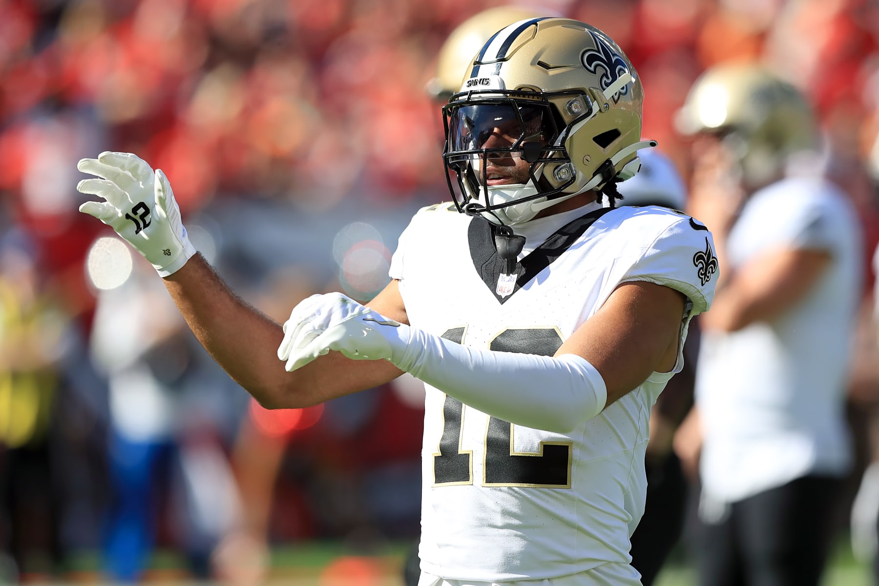 TAMPA, FL - DECEMBER 31: New Orleans Saints Wide Receiver Chris Olave (12) signals a first down during the regular season game between the New Orleans Saints and the Tampa Bay Buccaneers on December 31, 2023 at Raymond James Stadium in Tampa, Florida. (Photo by Cliff Welch/Icon Sportswire via Getty Images)