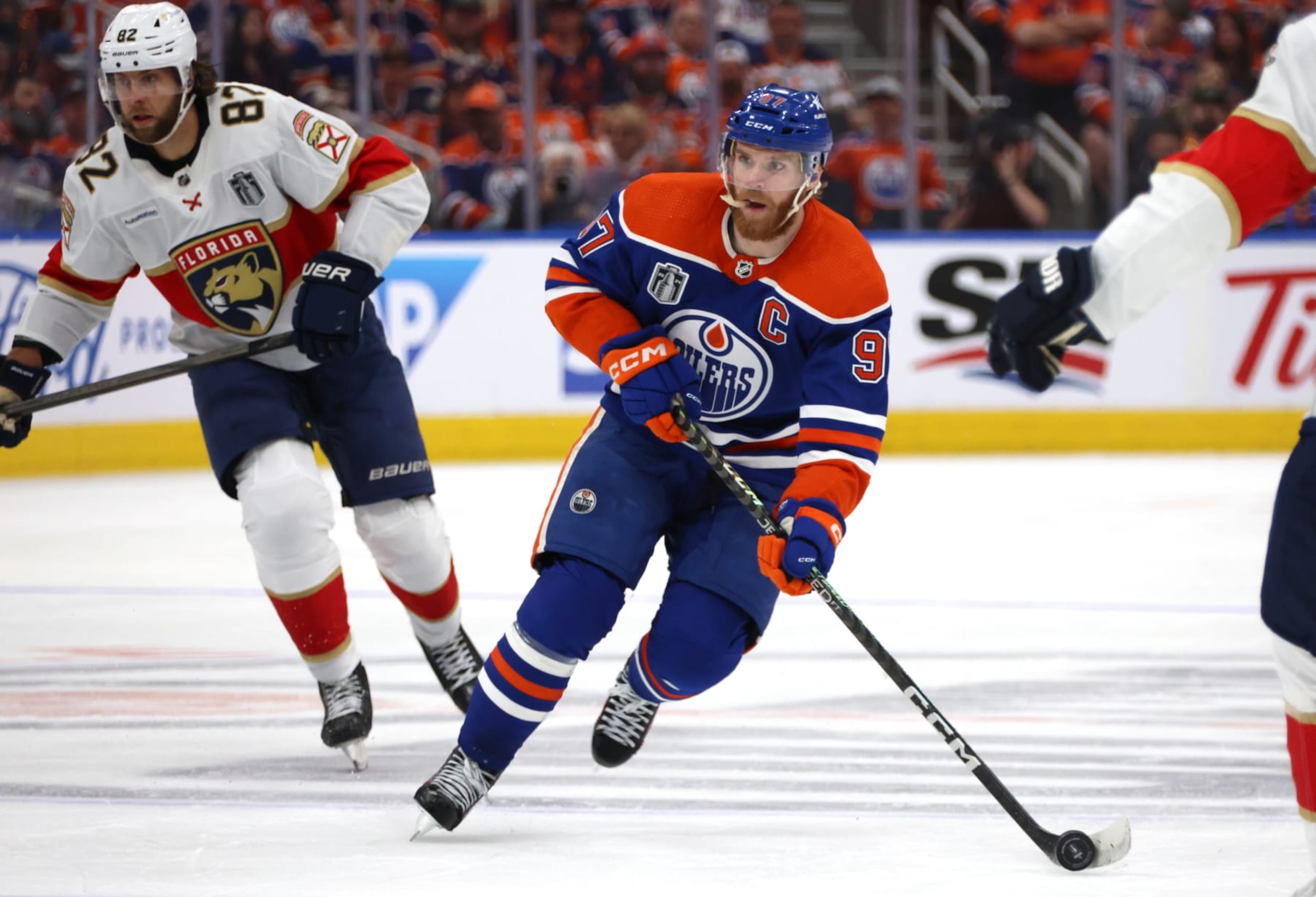 EDMONTON, ALBERTA - JUNE 15: Connor McDavid #97 of the Edmonton Oilers skates the puck into the Florida Panthers zone during the second period of Game Four of the 2024 Stanley Cup Final between the Florida Panthers and the Edmonton Oilers at Rogers Place on June 15, 2024 in Edmonton, Alberta. (Photo by Dave Sandford/NHLI via Getty Images)