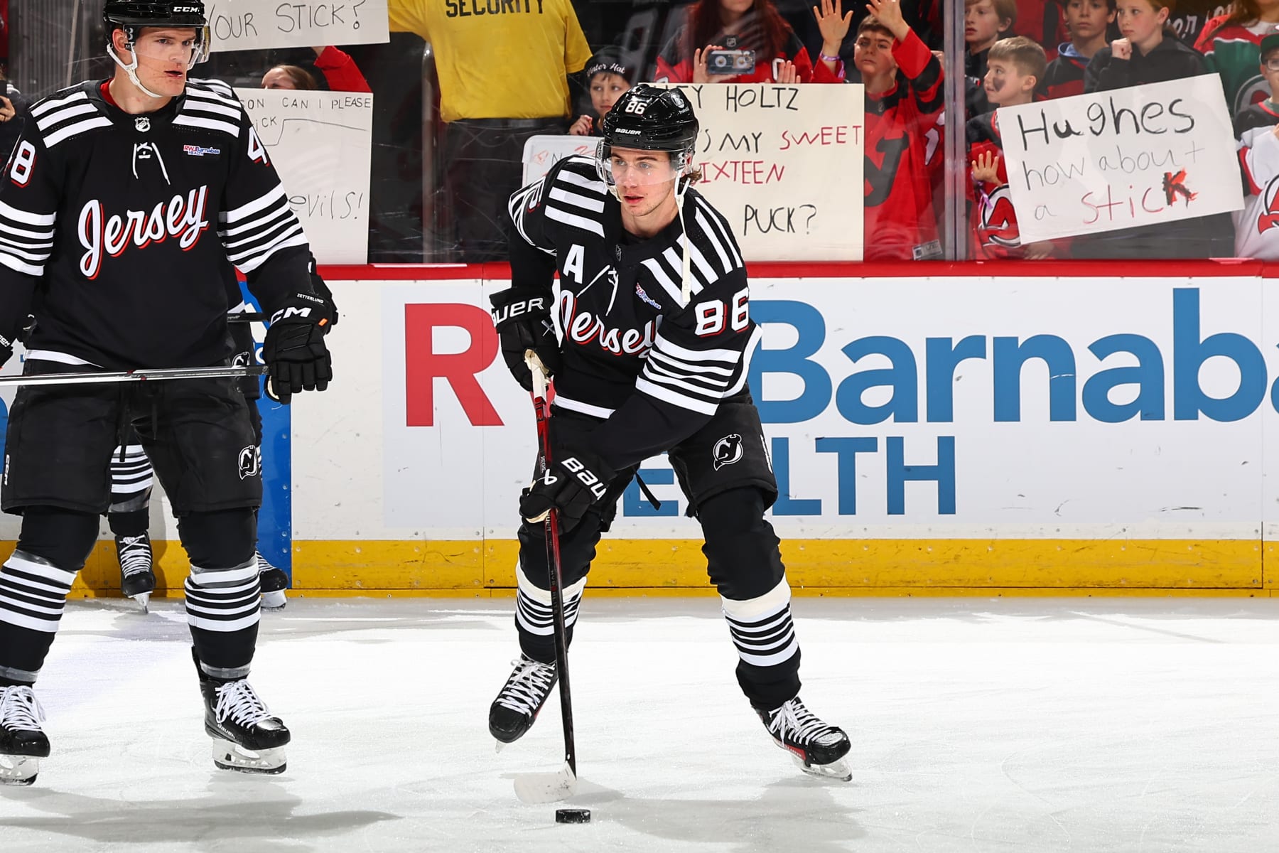 NEWARK, NJ - APRIL 07:  Jack Hughes #86 of the New Jersey Devils skates during warm up prior to the game against the Nashville Predators at the Prudential Center on April 7, 2024 in Newark, New Jersey.  (Photo by Rich Graessle/NHLI via Getty Images)