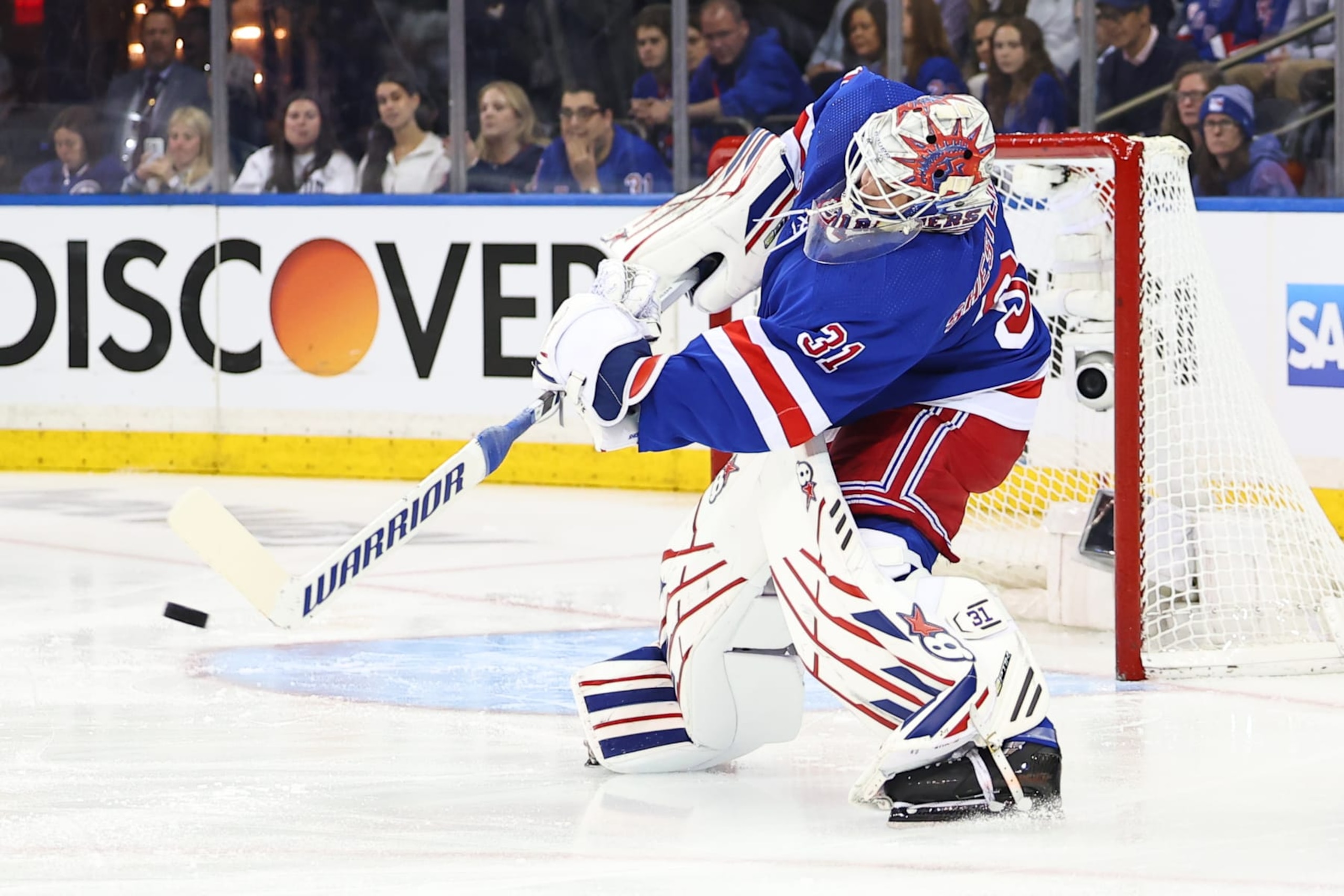 NEW YORK, NY - MAY 30: Igor Shesterkin #31 of the New York Rangers clears the puck during the first period of the Eastern Conference Final game 5 against the Florida Panthers on May 30, 2024 at Madison Square Garden in New York.  (Photo by Rich Graessle/Icon Sportswire via Getty Images)