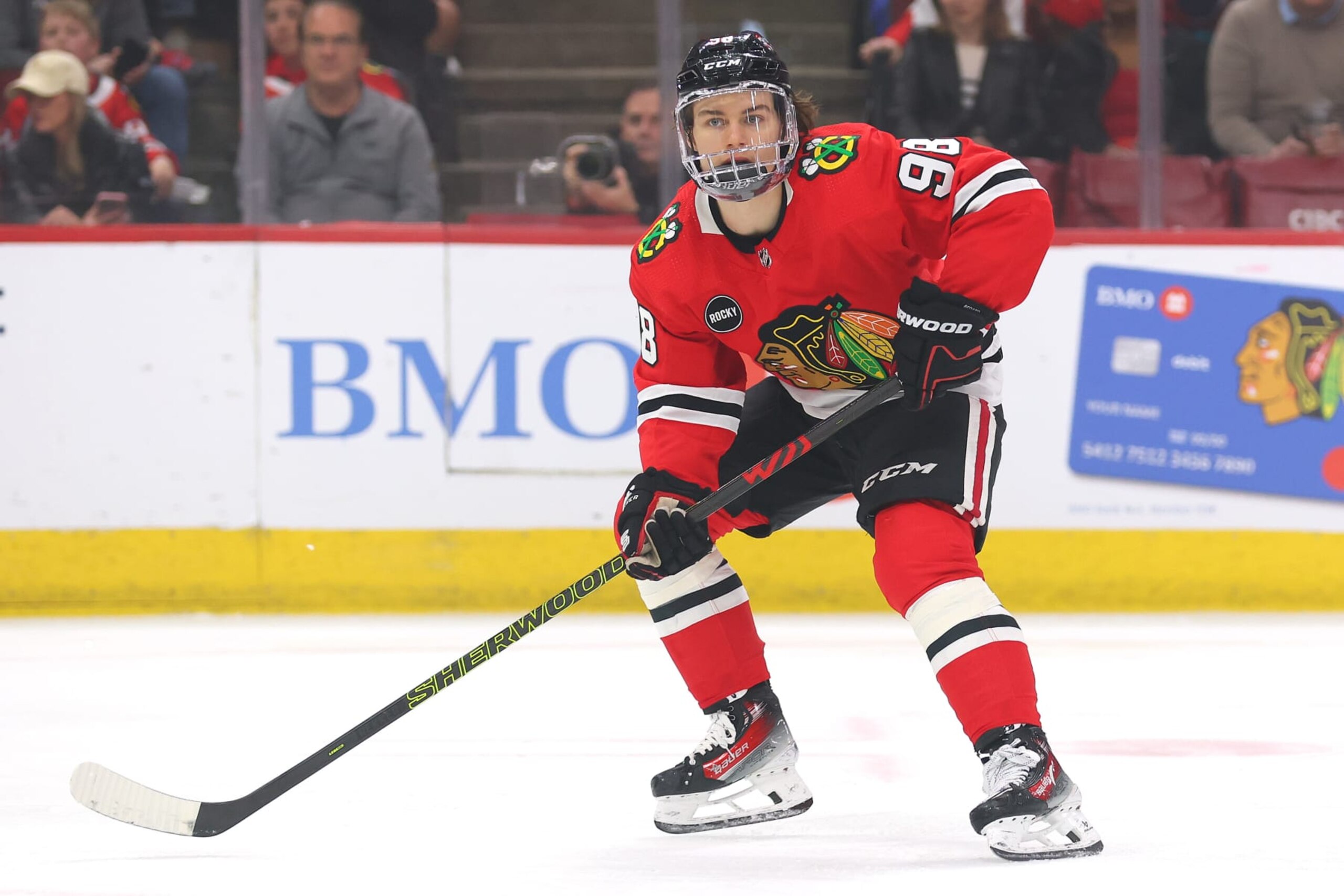 CHICAGO, ILLINOIS - APRIL 14: Connor Bedard #98 of the Chicago Blackhawks skates against the Carolina Hurricanes during the first period at the United Center on April 14, 2024 in Chicago, Illinois. (Photo by Michael Reaves/Getty Images)
