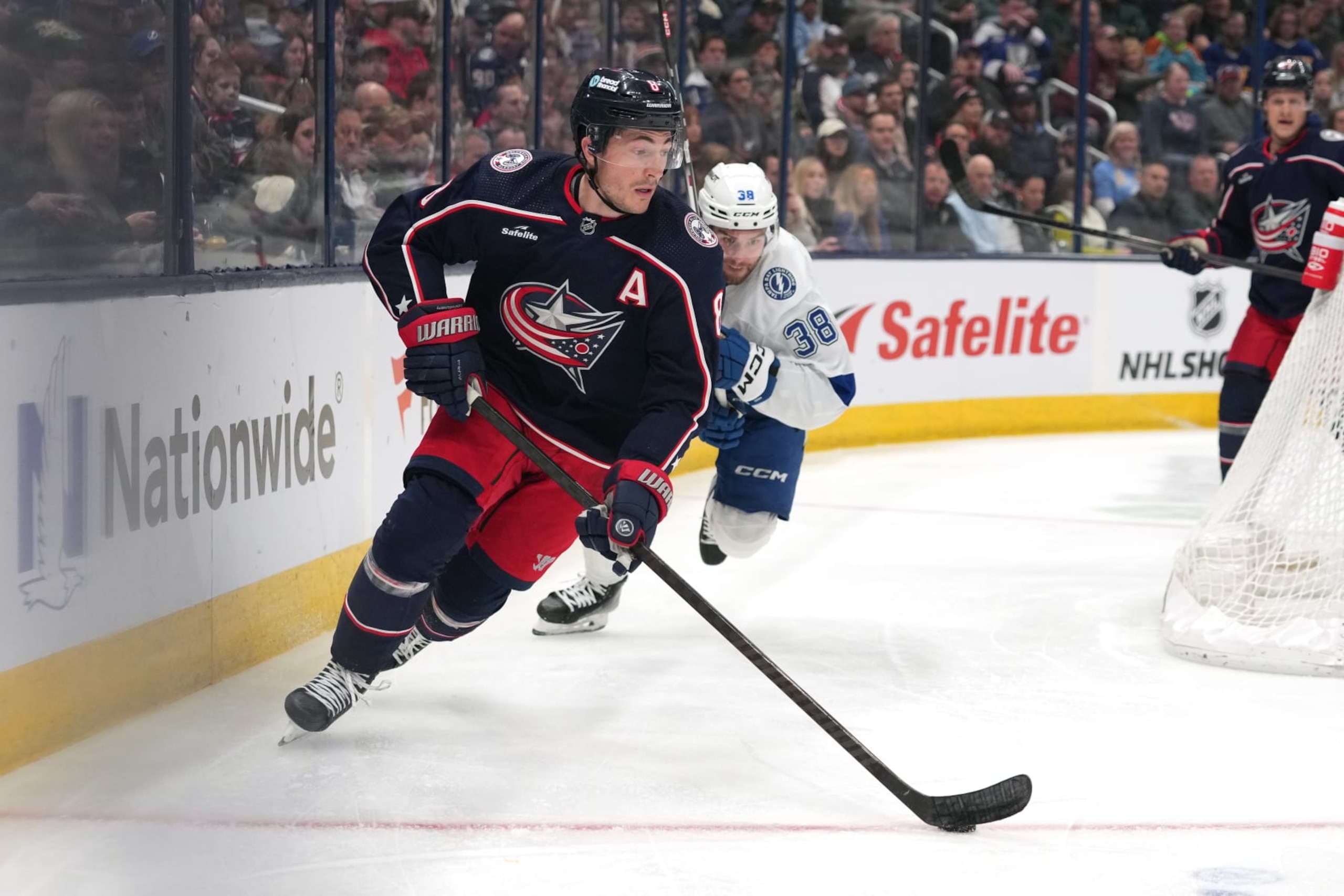 COLUMBUS, OHIO - FEBRUARY 10: Zach Werenski #8 of the Columbus Blue Jackets skates with the puck during the third period `av at Nationwide Arena on February 10, 2024 in Columbus, Ohio. (Photo by Jason Mowry/Getty Images)