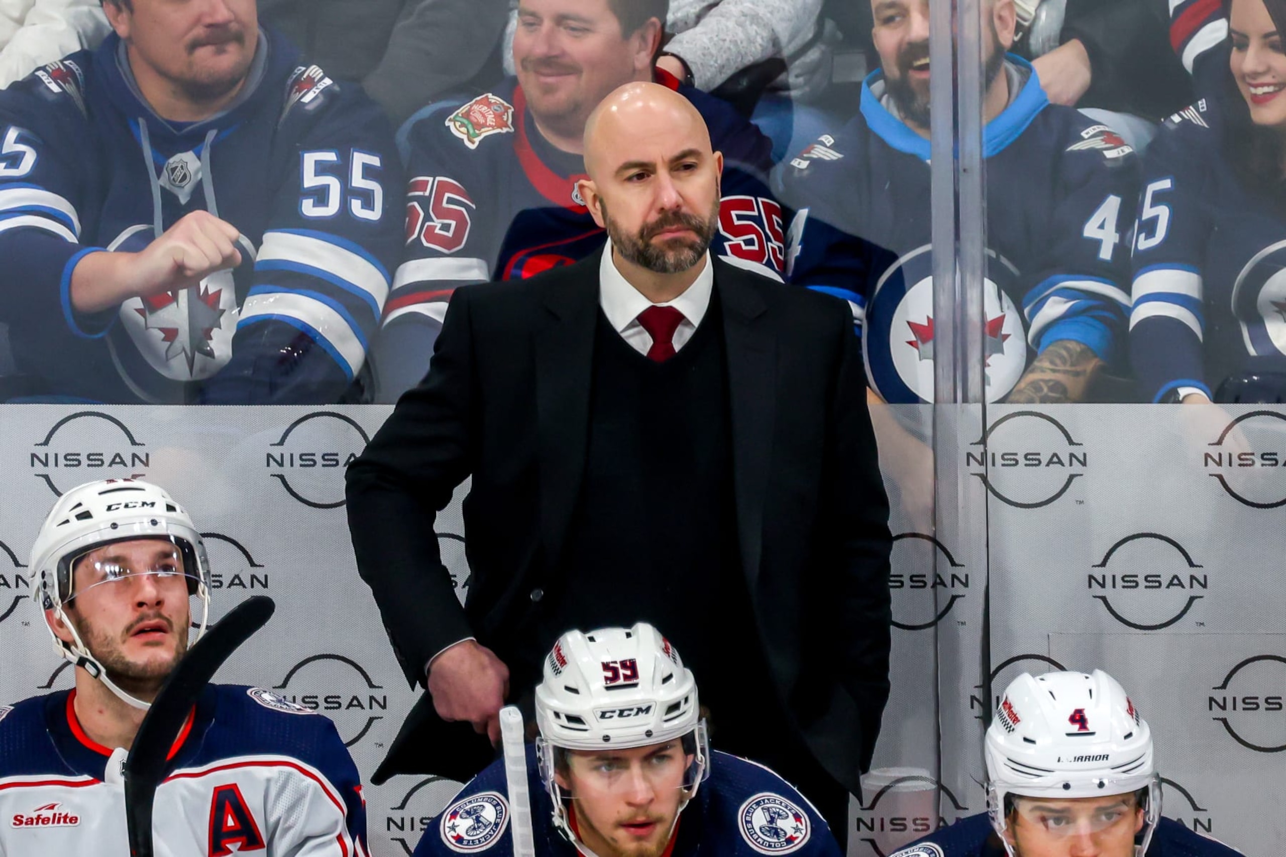 WINNIPEG, CANADA - JANUARY 09: Head coach Pascal Vincent of the Columbus Blue Jackets looks on from the bench during third period action against the Winnipeg Jets at Canada Life Centre on January 09, 2024 in Winnipeg, Manitoba, Canada. (Photo by Jonathan Kozub/NHLI via Getty Images) WINNIPEG, CANADA - JANUARY 09: Head coach Pascal Vincent of the Columbus Blue Jackets looks on from the bench during third period action against the Winnipeg Jets at Canada Life Centre on January 09, 2024 in Winnipeg, Manitoba, Canada. (Photo by Jonathan Kozub/NHLI via Getty Images)