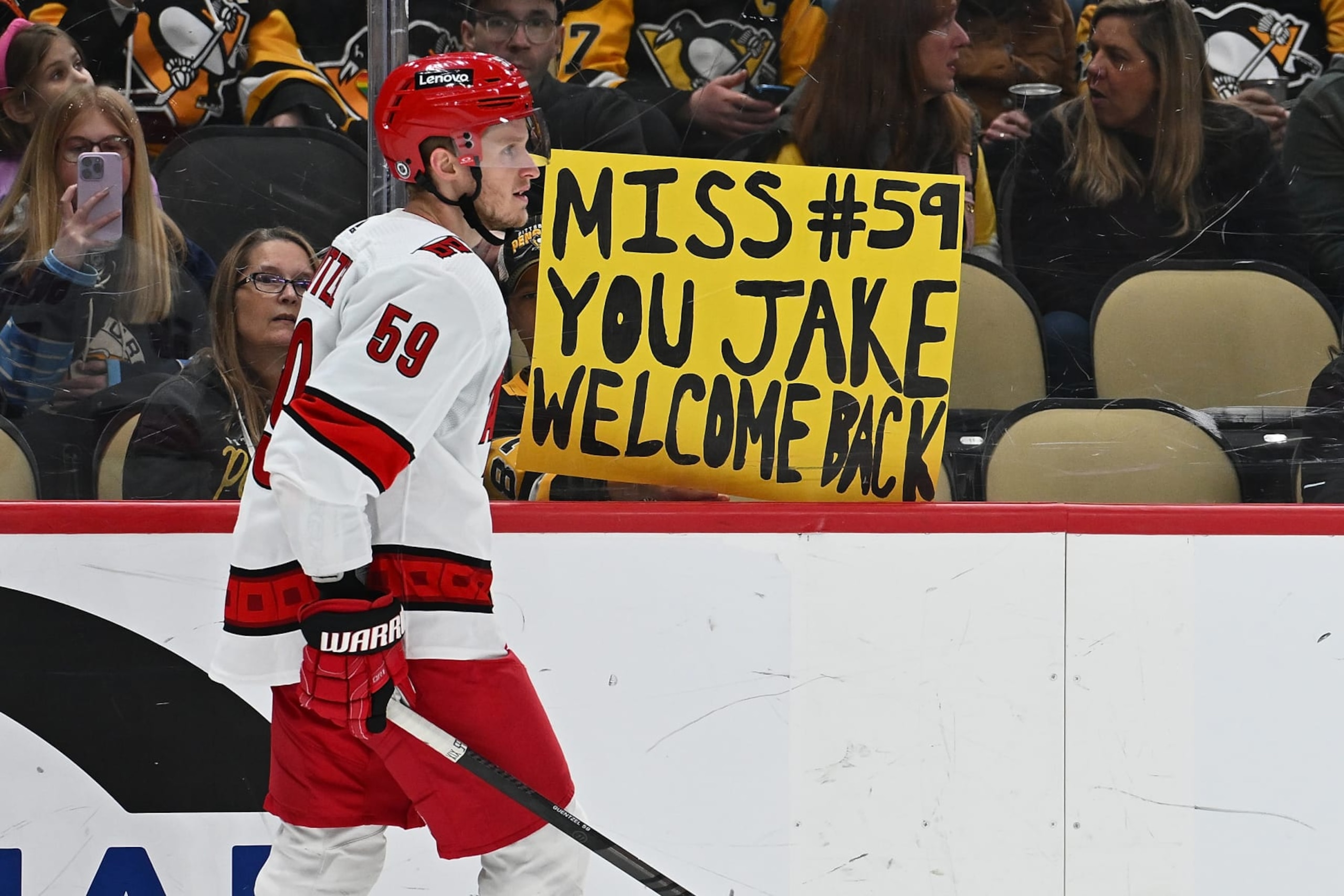 PITTSBURGH, PENNSYLVANIA - MARCH 26: A fan holds up a sign about Jake Guentzel #59 of the Carolina Hurricanes in the second period during the game between the Pittsburgh Penguins and the Carolina Hurricanes at PPG PAINTS Arena on March 26, 2024 in Pittsburgh, Pennsylvania. (Photo by Justin Berl/Getty Images) PITTSBURGH, PENNSYLVANIA - MARCH 26: A fan holds up a sign about Jake Guentzel #59 of the Carolina Hurricanes in the second period during the game between the Pittsburgh Penguins and the Carolina Hurricanes at PPG PAINTS Arena on March 26, 2024 in Pittsburgh, Pennsylvania. (Photo by Justin Berl/Getty Images)