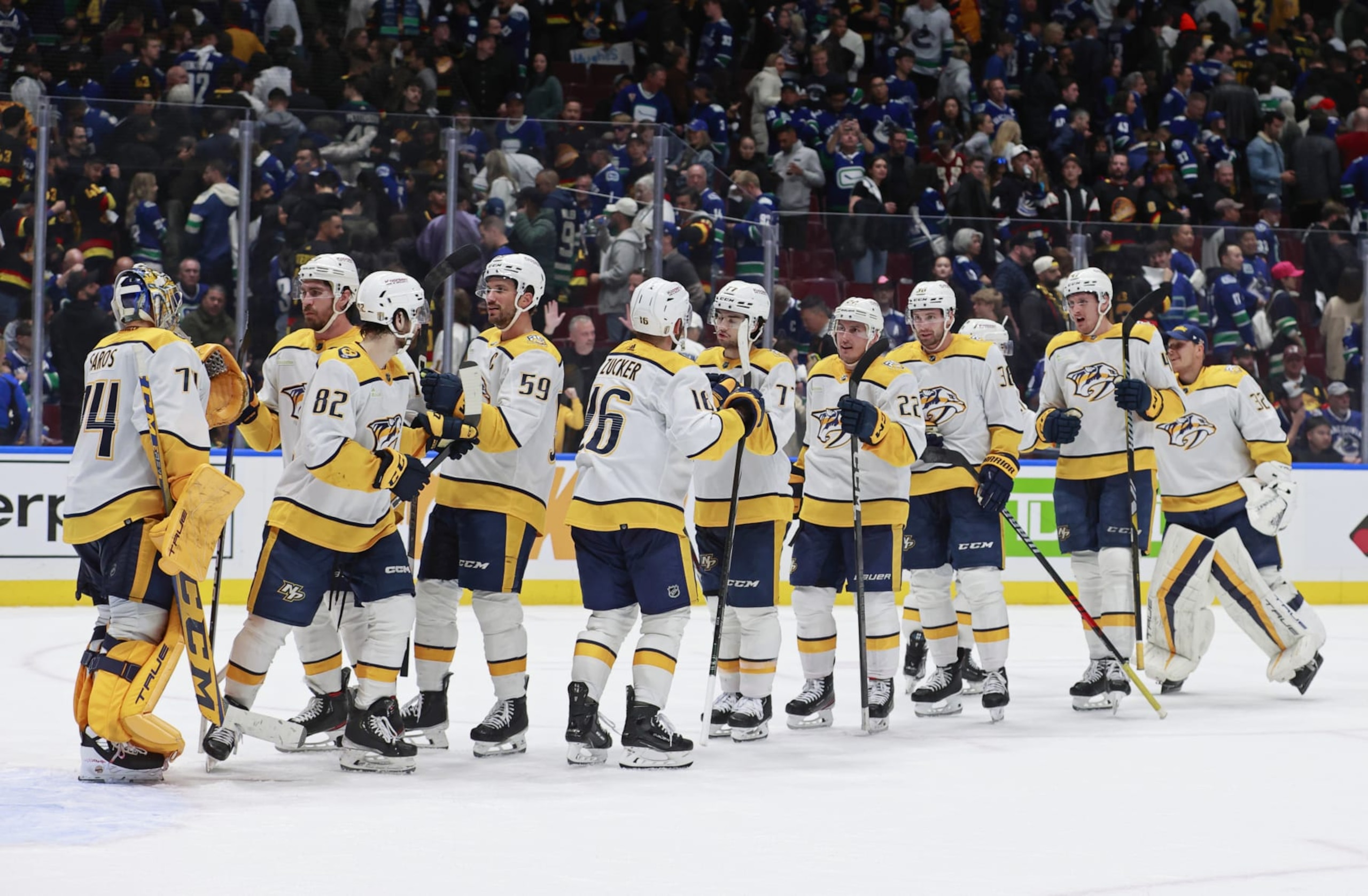 VANCOUVER, CANADA - APRIL 30: The Nashville Predators celebrate after winning against the Vancouver Canucks in Game Five of the First Round of the 2024 Stanley Cup Playoffs at Rogers Arena on April 30, 2024 in Vancouver, British Columbia, Canada. (Photo by Jeff Vinnick/NHLI via Getty Images) VANCOUVER, CANADA - APRIL 30: The Nashville Predators celebrate after winning against the Vancouver Canucks in Game Five of the First Round of the 2024 Stanley Cup Playoffs at Rogers Arena on April 30, 2024 in Vancouver, British Columbia, Canada. (Photo by Jeff Vinnick/NHLI via Getty Images)