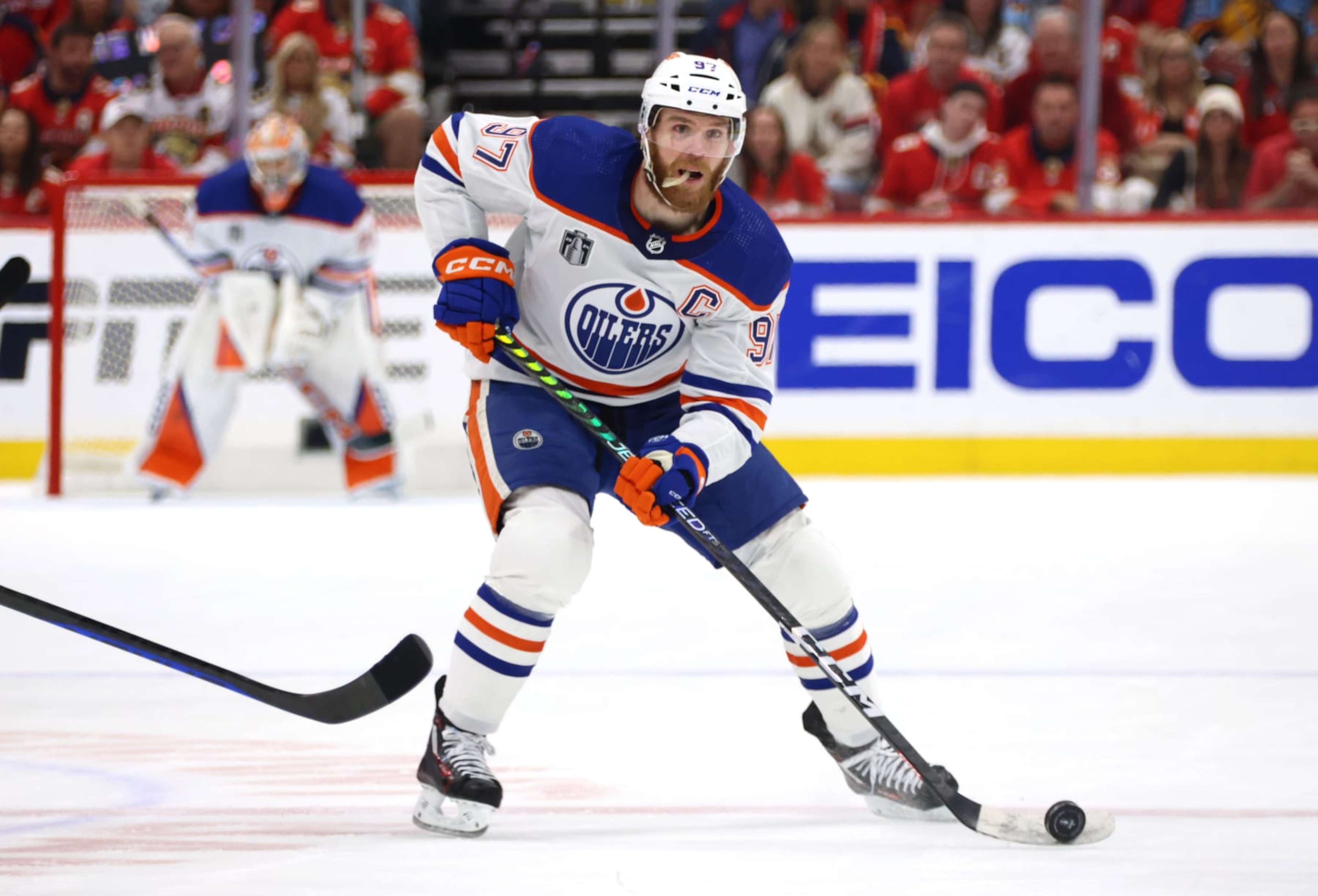 SUNRISE, FLORIDA - JUNE 18: Connor McDavid #97 of the Edmonton Oilers skates the puck through the neutral zone during the first period of Game Five of the 2024 Stanley Cup Final between the Edmonton Oilers and the Florida Panthers at Amerant Bank Arena on June 18, 2024 in Sunrise, Florida. (Photo by Dave Sandford/NHLI via Getty Images) SUNRISE, FLORIDA - JUNE 18: Connor McDavid #97 of the Edmonton Oilers skates the puck through the neutral zone during the first period of Game Five of the 2024 Stanley Cup Final between the Edmonton Oilers and the Florida Panthers at Amerant Bank Arena on June 18, 2024 in Sunrise, Florida. (Photo by Dave Sandford/NHLI via Getty Images)