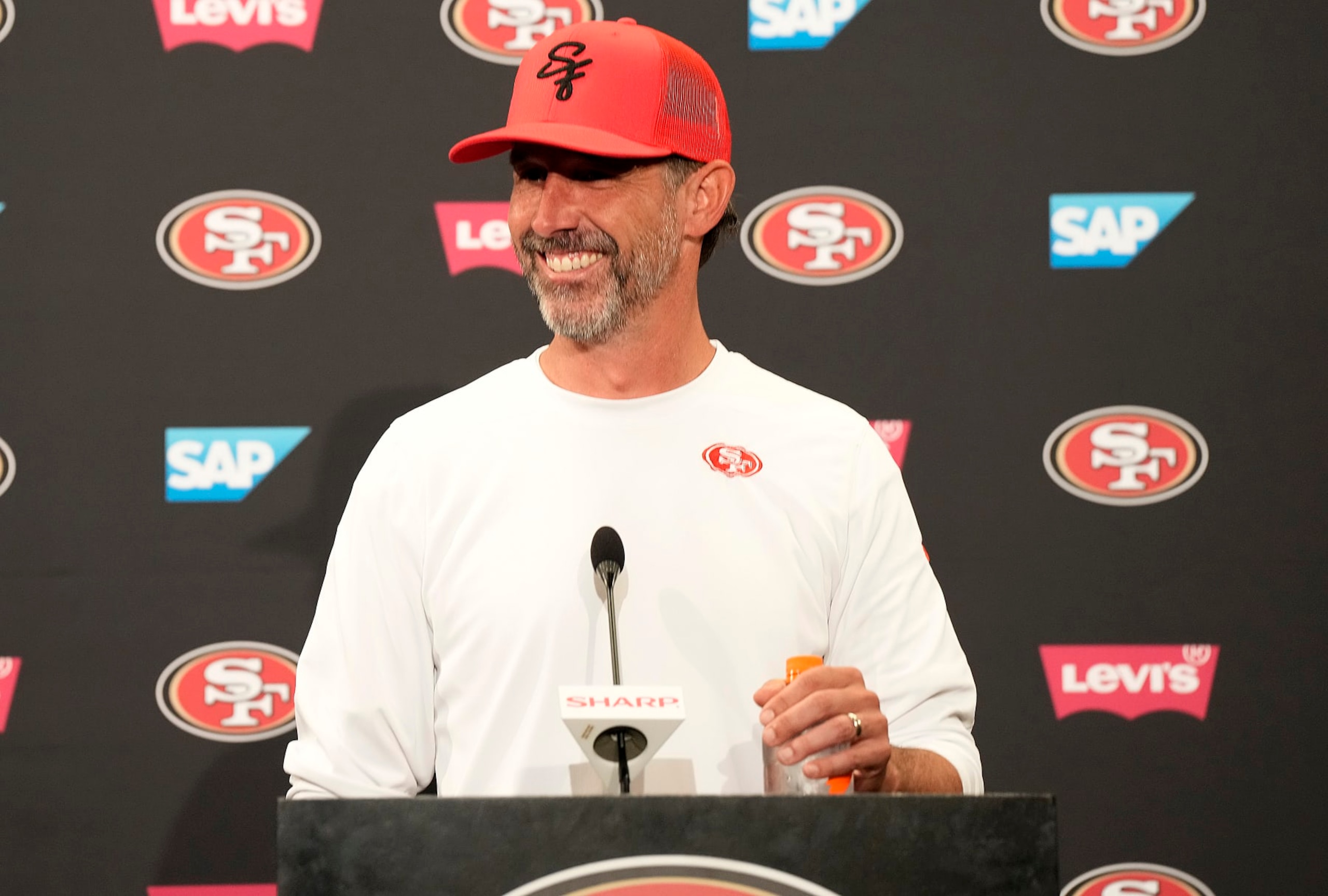 SANTA CLARA, CALIFORNIA - JUNE 04: Head coach Kyle Shanahan of the San Francisco 49ers speaks to the media during a press conference after a mini camp work out on June 04, 2024 in Santa Clara, California. (Photo by Thearon W. Henderson/Getty Images)