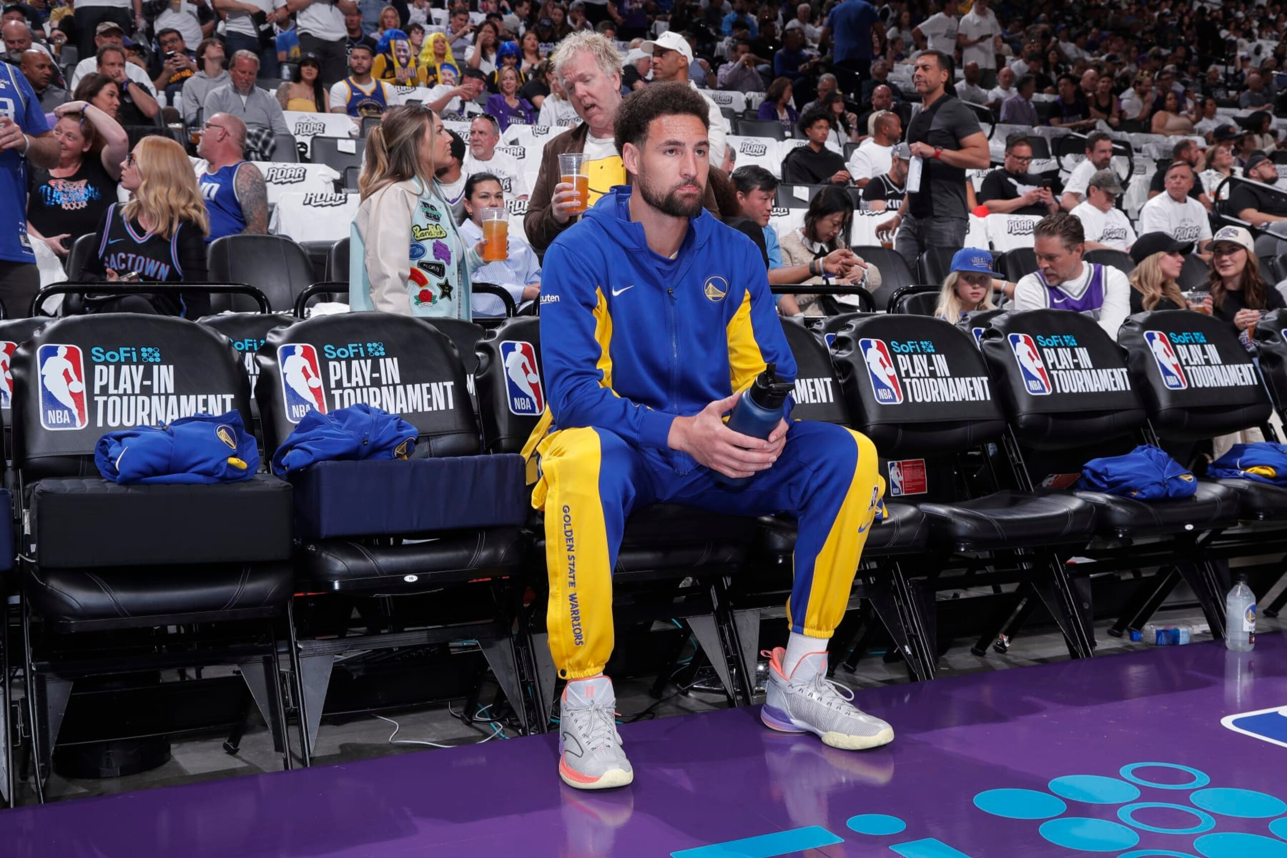 SACRAMENTO, CA - APRIL 16: Klay Thompson #11 of the Golden State Warriors looks on from the bench prior to the game against the Sacramento Kings during the 2024 Play-In Tournament on April 16, 2024 at Golden 1 Center in Sacramento, California. NOTE TO USER: User expressly acknowledges and agrees that, by downloading and or using this photograph, User is consenting to the terms and conditions of the Getty Images Agreement. Mandatory Copyright Notice: Copyright 2024 NBAE (Photo by Rocky Widner/NBAE via Getty Images)