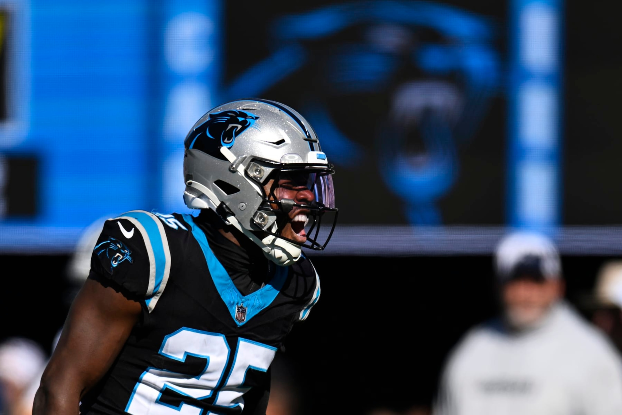 CHARLOTTE, NORTH CAROLINA - NOVEMBER 19: Xavier Woods #25 of the Carolina Panthers celebrates breaking up a Dallas Cowboys pass in the first quarter at Bank of America Stadium on November 19, 2023 in Charlotte, North Carolina. (Photo by Eakin Howard/Getty Images)