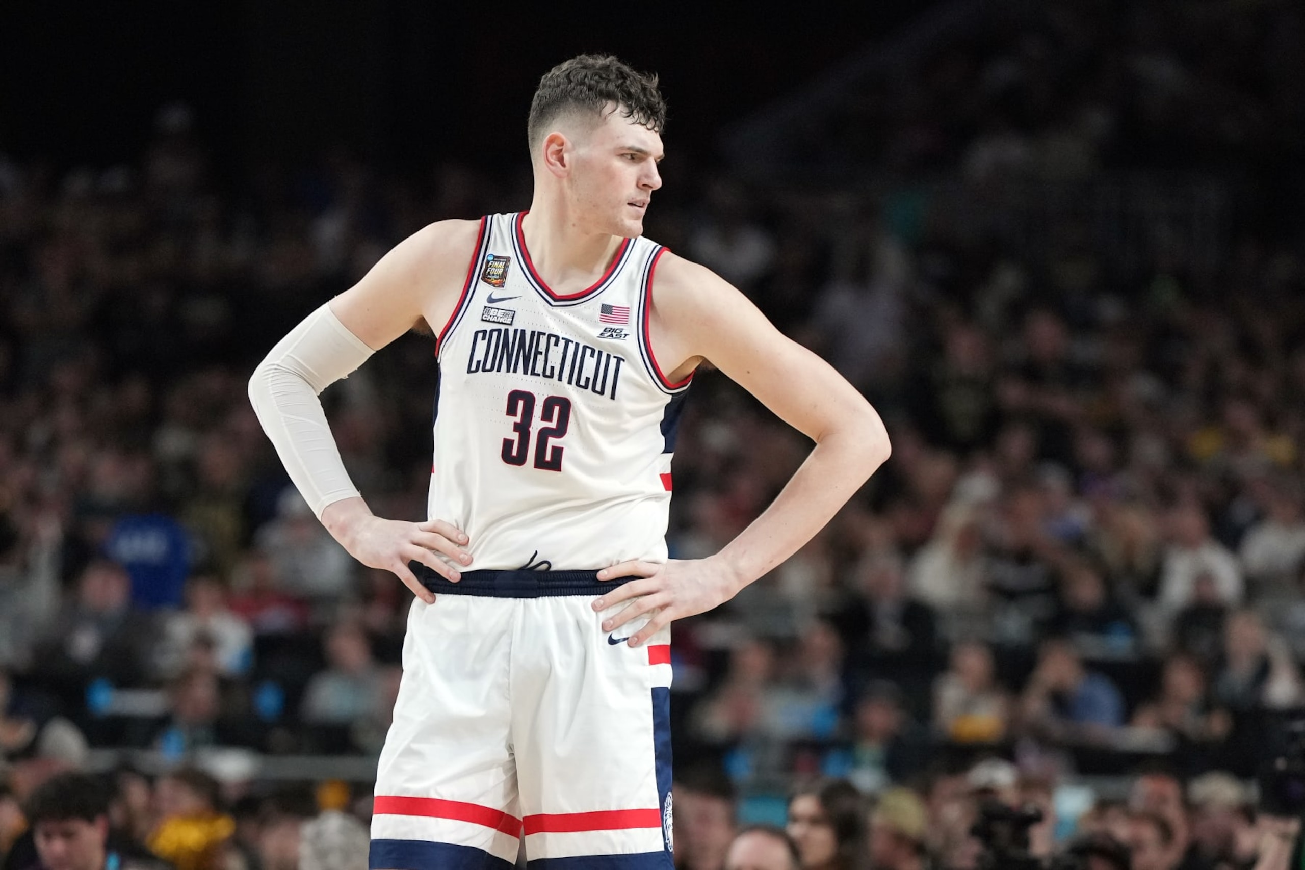 GLENDALE, ARIZONA - APRIL 08:  Donovan Clingan #32 of the Connecticut Huskies looks on during the National College Basketball Championship game against the Purdue Boilermakers at State Farm Stadium on April 08, 2024 in Glendale, Arizona.  (Photo by Mitchell Layton/Getty Images)