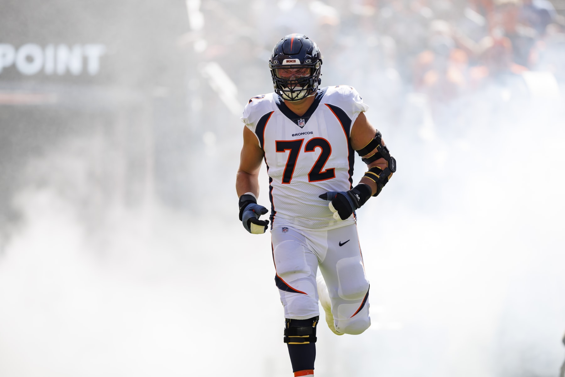 DENVER, COLORADO - SEPTEMBER 17: Garett Bolles #72 of the Denver Broncos runs onto the field during player introductions prior to an NFL football game against the Washington Commanders at Empower Field At Mile High on September 17, 2023 in Denver, Colorado. (Photo by Ryan Kang/Getty Images)