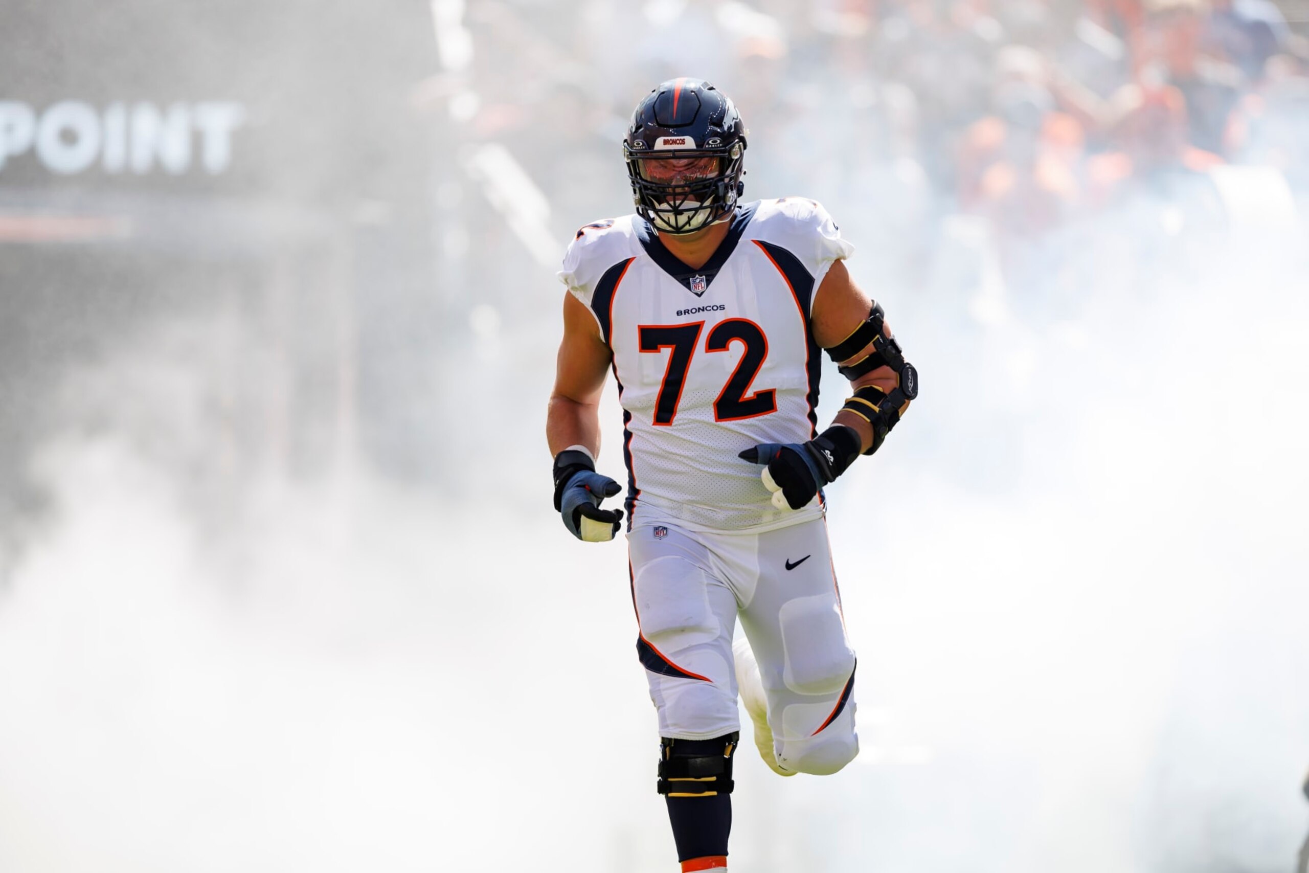 DENVER, COLORADO - SEPTEMBER 17: Garett Bolles #72 of the Denver Broncos runs onto the field during player introductions prior to an NFL football game against the Washington Commanders at Empower Field At Mile High on September 17, 2023 in Denver, Colorado. (Photo by Ryan Kang/Getty Images)
