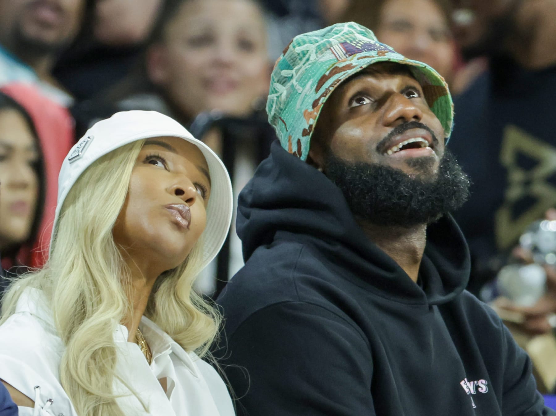 LAS VEGAS, NEVADA - JUNE 15: Savannah James (L) and NBA player LeBron James of the Los Angeles Lakers attend a game between the New York Liberty and the Las Vegas Aces at Michelob ULTRA Arena on June 15, 2024 in Las Vegas, Nevada. The Liberty defeated the Aces 90-82. NOTE TO USER: User expressly acknowledges and agrees that, by downloading and or using this photograph, User is consenting to the terms and conditions of the Getty Images License Agreement. (Photo by Ethan Miller/Getty Images)