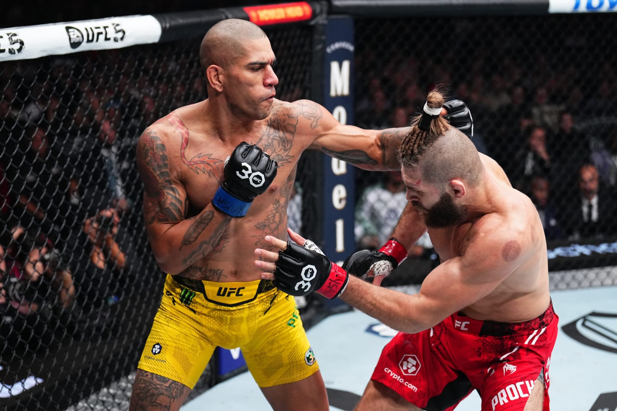 Alex Pereira wobbles Jiri Prochazka with a punch at UFC 295.