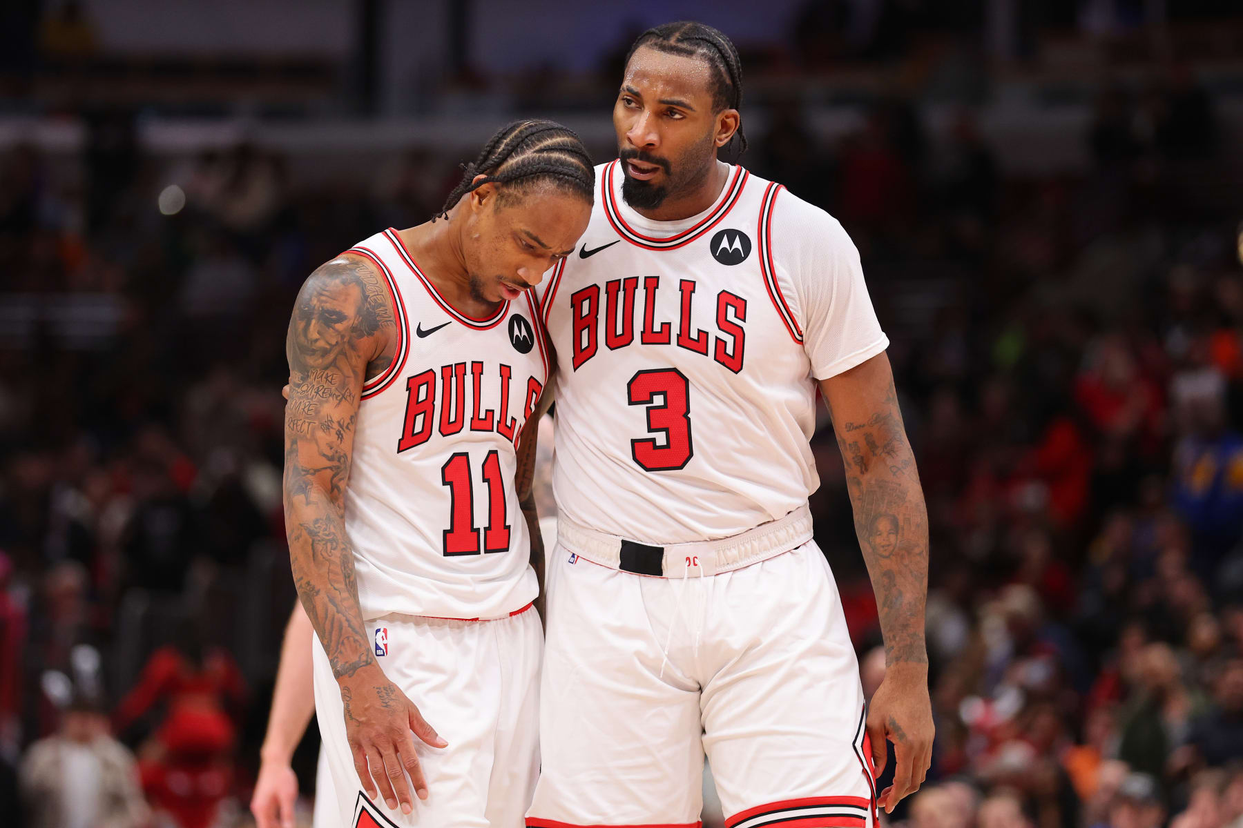 CHICAGO, ILLINOIS - FEBRUARY 28: DeMar DeRozan #11 and Andre Drummond #3 of the Chicago Bulls react against the Cleveland Cavaliers during the second half at the United Center on February 28, 2024 in Chicago, Illinois. NOTE TO USER: User expressly acknowledges and agrees that, by downloading and or using this photograph, User is consenting to the terms and conditions of the Getty Images License Agreement. (Photo by Michael Reaves/Getty Images)