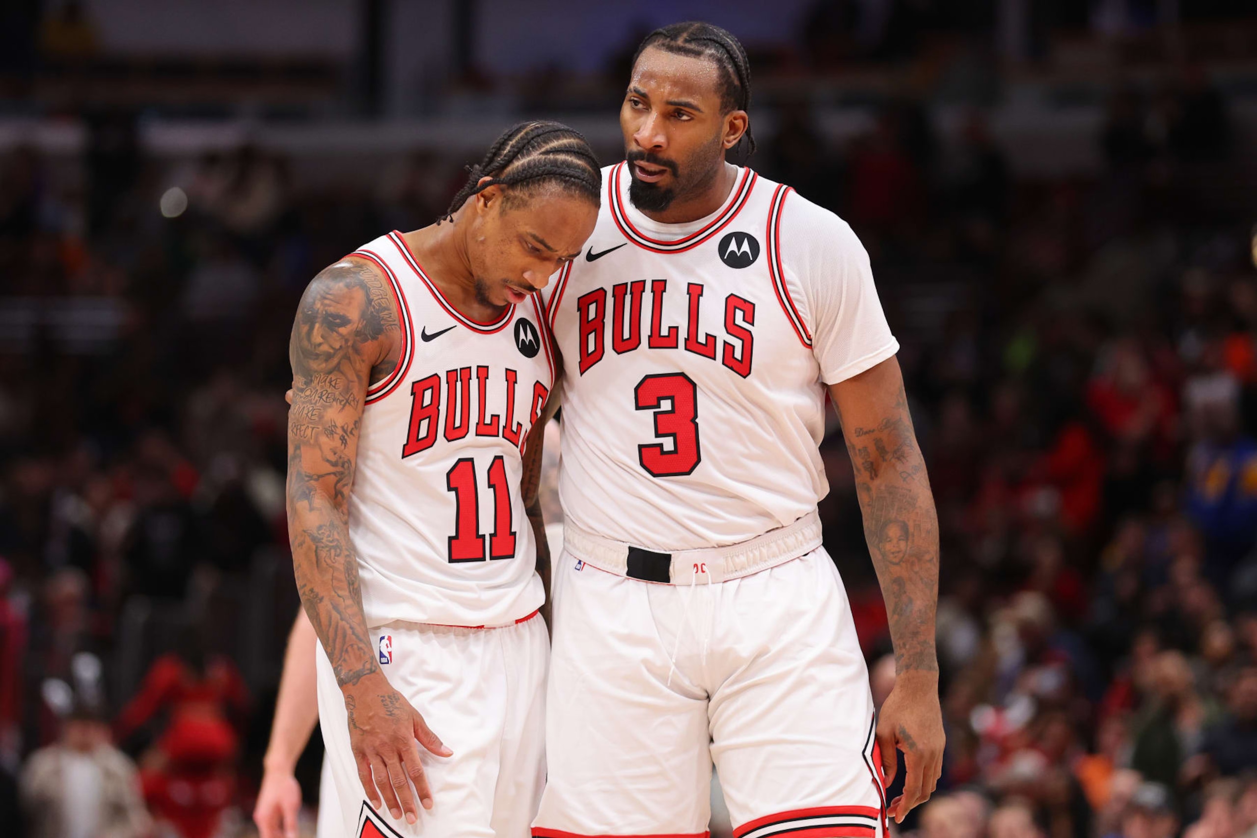 CHICAGO, ILLINOIS - FEBRUARY 28: DeMar DeRozan #11 and Andre Drummond #3 of the Chicago Bulls react against the Cleveland Cavaliers during the second half at the United Center on February 28, 2024 in Chicago, Illinois. NOTE TO USER: User expressly acknowledges and agrees that, by downloading and or using this photograph, User is consenting to the terms and conditions of the Getty Images License Agreement. (Photo by Michael Reaves/Getty Images)