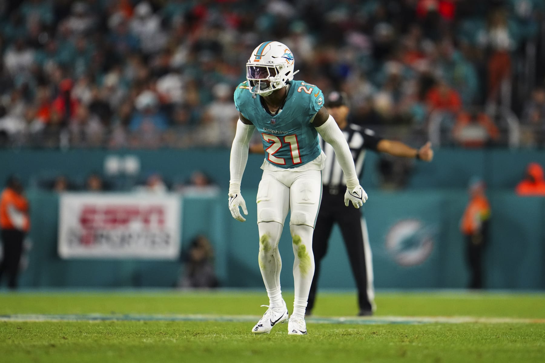 MIAMI GARDENS, FL - DECEMBER 11: DeShon Elliott #21 of the Miami Dolphins defends in coverage during an NFL football game against the Tennessee Titans at Hard Rock Stadium on December 11, 2023 in Miami Gardens, Florida. (Photo by Cooper Neill/Getty Images)