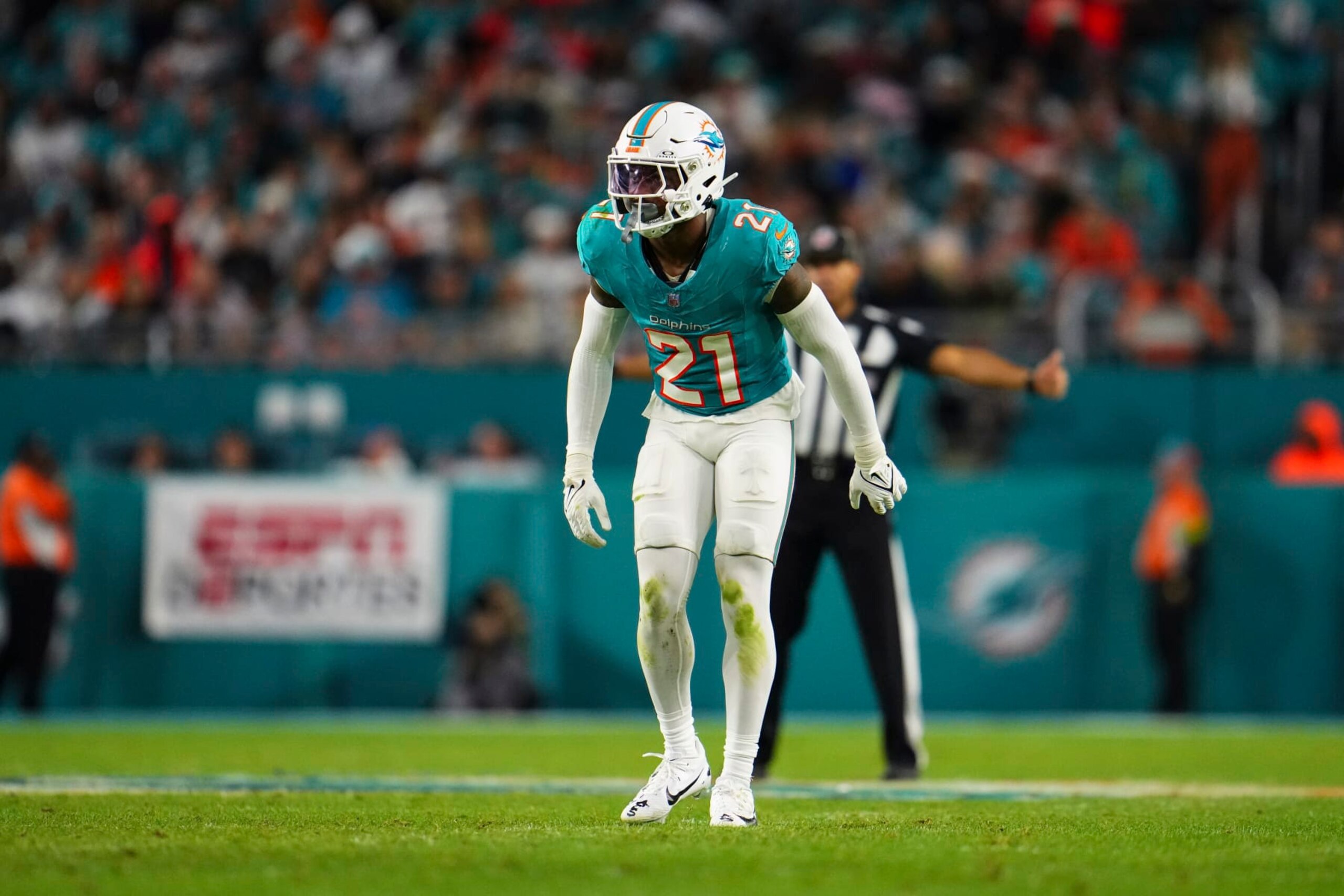 MIAMI GARDENS, FL - DECEMBER 11: DeShon Elliott #21 of the Miami Dolphins defends in coverage during an NFL football game against the Tennessee Titans at Hard Rock Stadium on December 11, 2023 in Miami Gardens, Florida. (Photo by Cooper Neill/Getty Images)