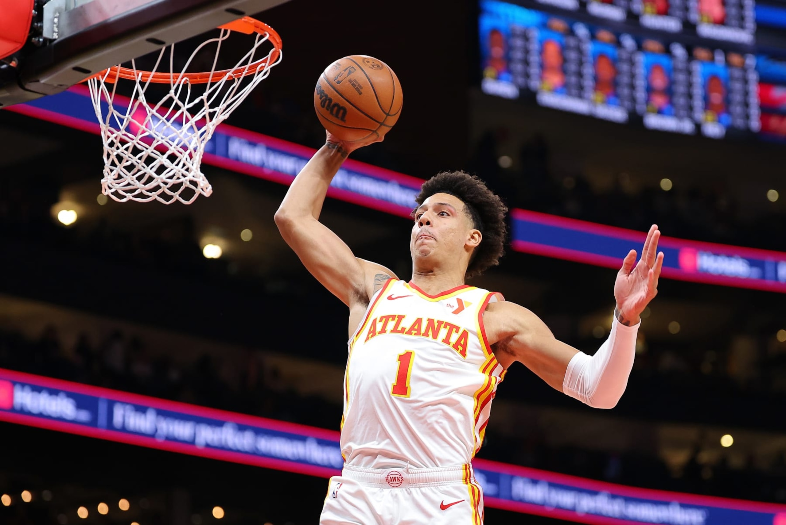 ATLANTA, GEORGIA - APRIL 03:  Jalen Johnson #1 of the Atlanta Hawks dunks against the Detroit Pistons during the first quarter at State Farm Arena on April 03, 2024 in Atlanta, Georgia.  NOTE TO USER: User expressly acknowledges and agrees that, by downloading and/or using this photograph, user is consenting to the terms and conditions of the Getty Images License Agreement.  (Photo by Kevin C. Cox/Getty Images)