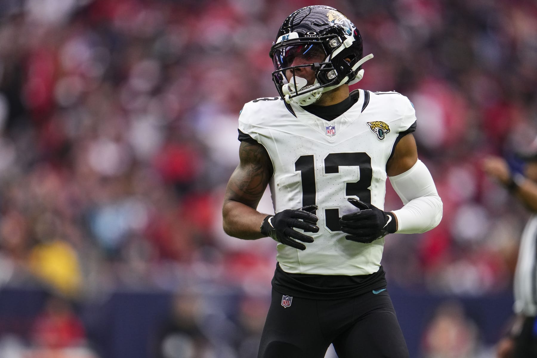 HOUSTON, TX - NOVEMBER 26: Christian Kirk #13 of the Jacksonville Jaguars runs across the field during an NFL football game against the Houston Texans at NRG Stadium on November 26, 2023 in Houston, Texas. (Photo by Cooper Neill/Getty Images)