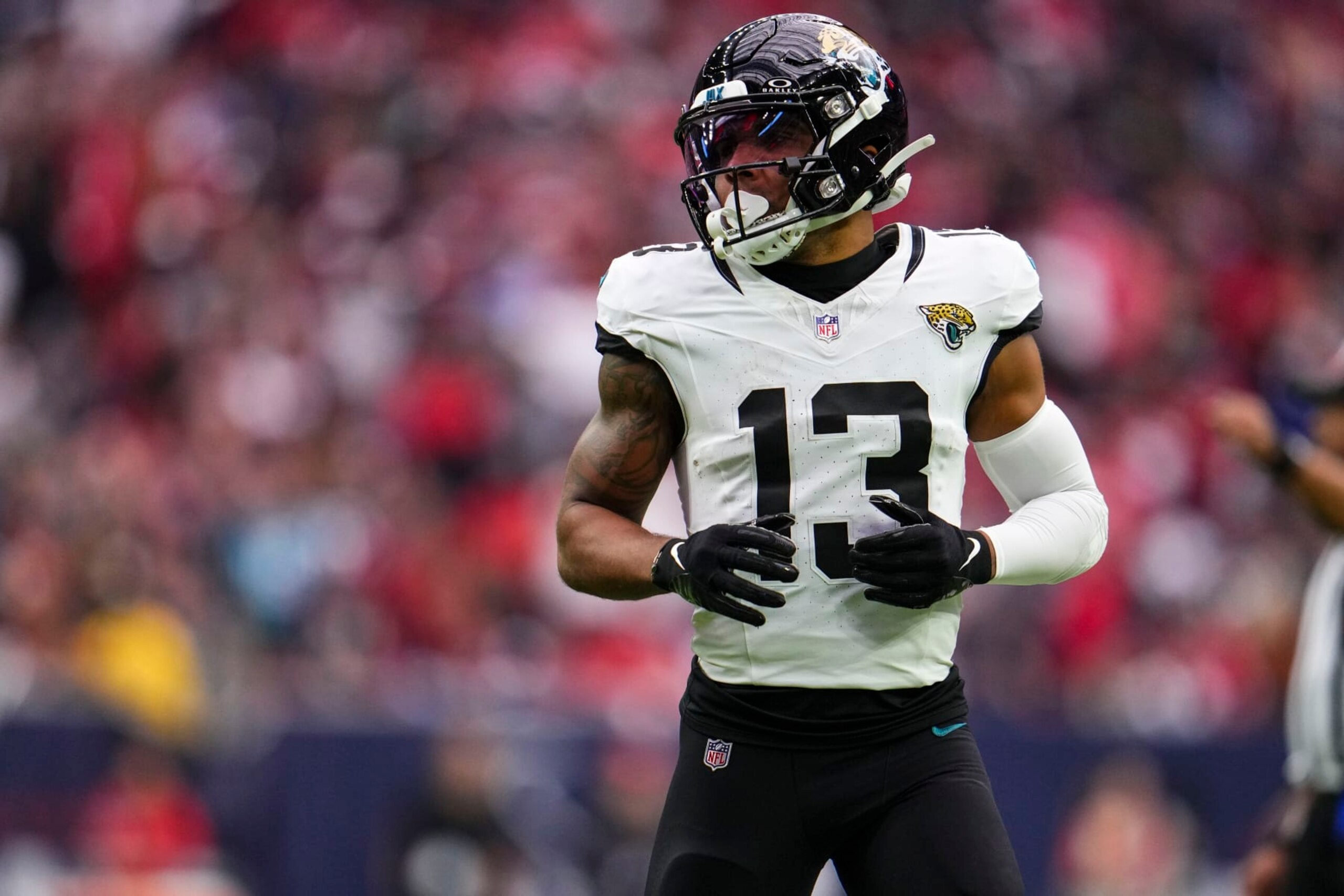 HOUSTON, TX - NOVEMBER 26: Christian Kirk #13 of the Jacksonville Jaguars runs across the field during an NFL football game against the Houston Texans at NRG Stadium on November 26, 2023 in Houston, Texas. (Photo by Cooper Neill/Getty Images)
