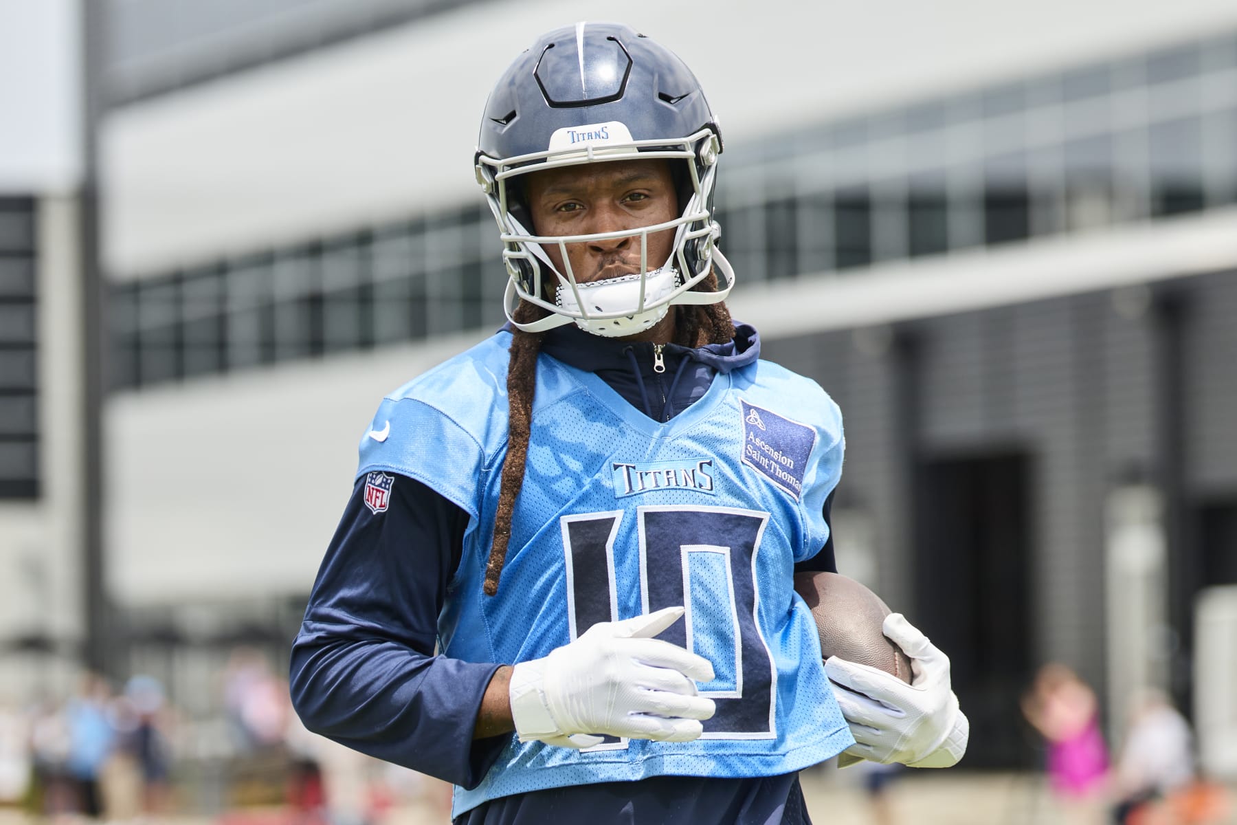 NASHVILLE, TENNESSEE - JUNE 05: DeAndre Hopkins #10 of the Tennessee Titans looks on during day 2 of Titans Mandatory Minicamp at Ascension Saint Thomas Sports Park on June 05, 2024 in Nashville, Tennessee. (Photo by Johnnie Izquierdo/Getty Images)