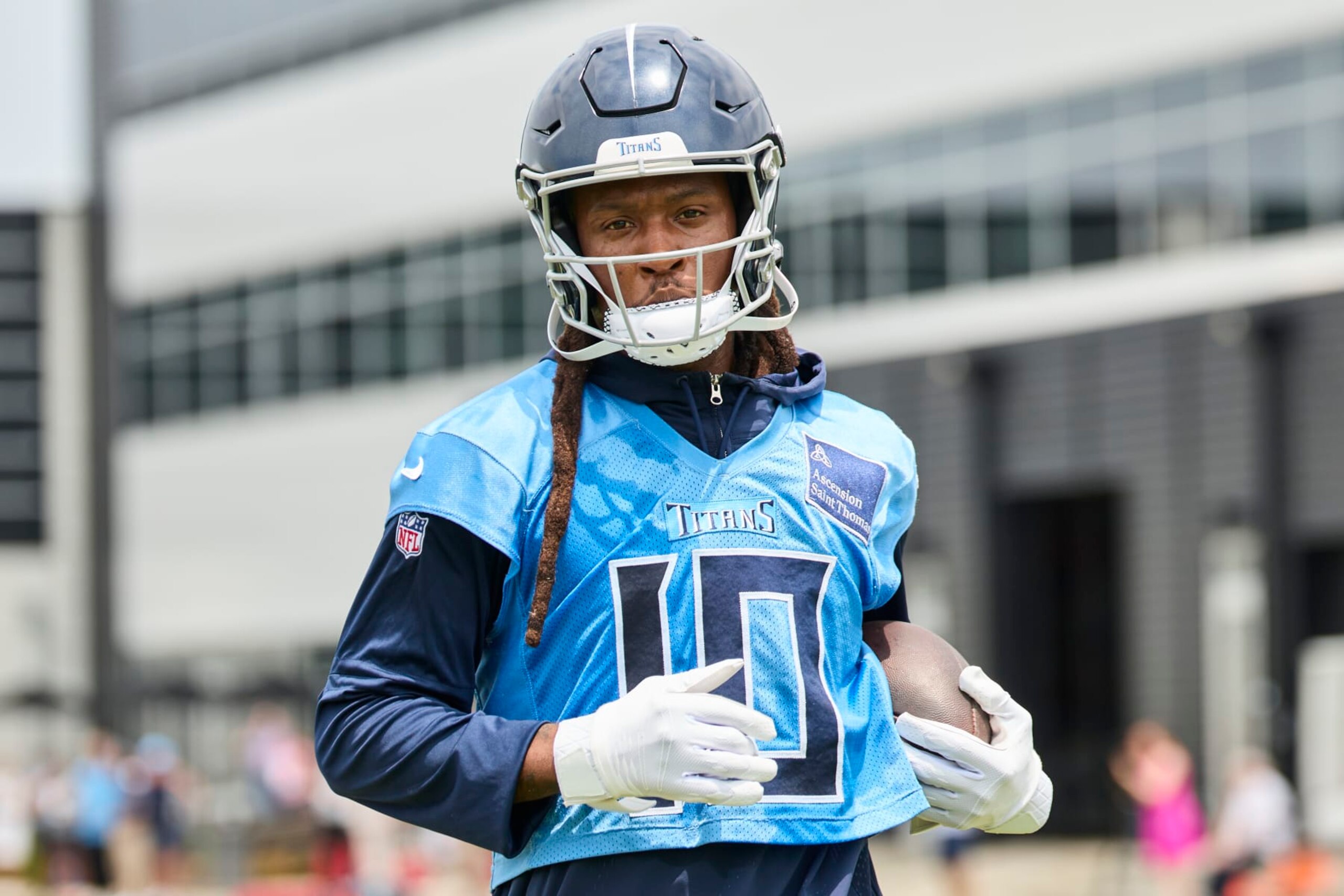 NASHVILLE, TENNESSEE - JUNE 05: DeAndre Hopkins #10 of the Tennessee Titans looks on during day 2 of Titans Mandatory Minicamp at Ascension Saint Thomas Sports Park on June 05, 2024 in Nashville, Tennessee. (Photo by Johnnie Izquierdo/Getty Images)