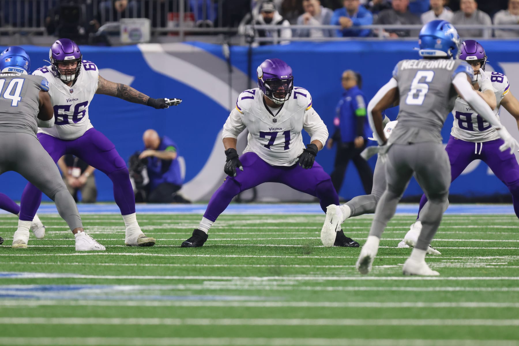 DETROIT, MI - JANUARY 07:  Minnesota Vikings offensive tackle Christian Darrisaw (71) and Minnesota Vikings offensive guard Dalton Risner (66) block during an NFL football game between the Minnesota Vikings and the Detroit Lions on January 7, 2024 at Ford Field in Detroit, Michigan.  (Photo by Scott W. Grau/Icon Sportswire via Getty Images)