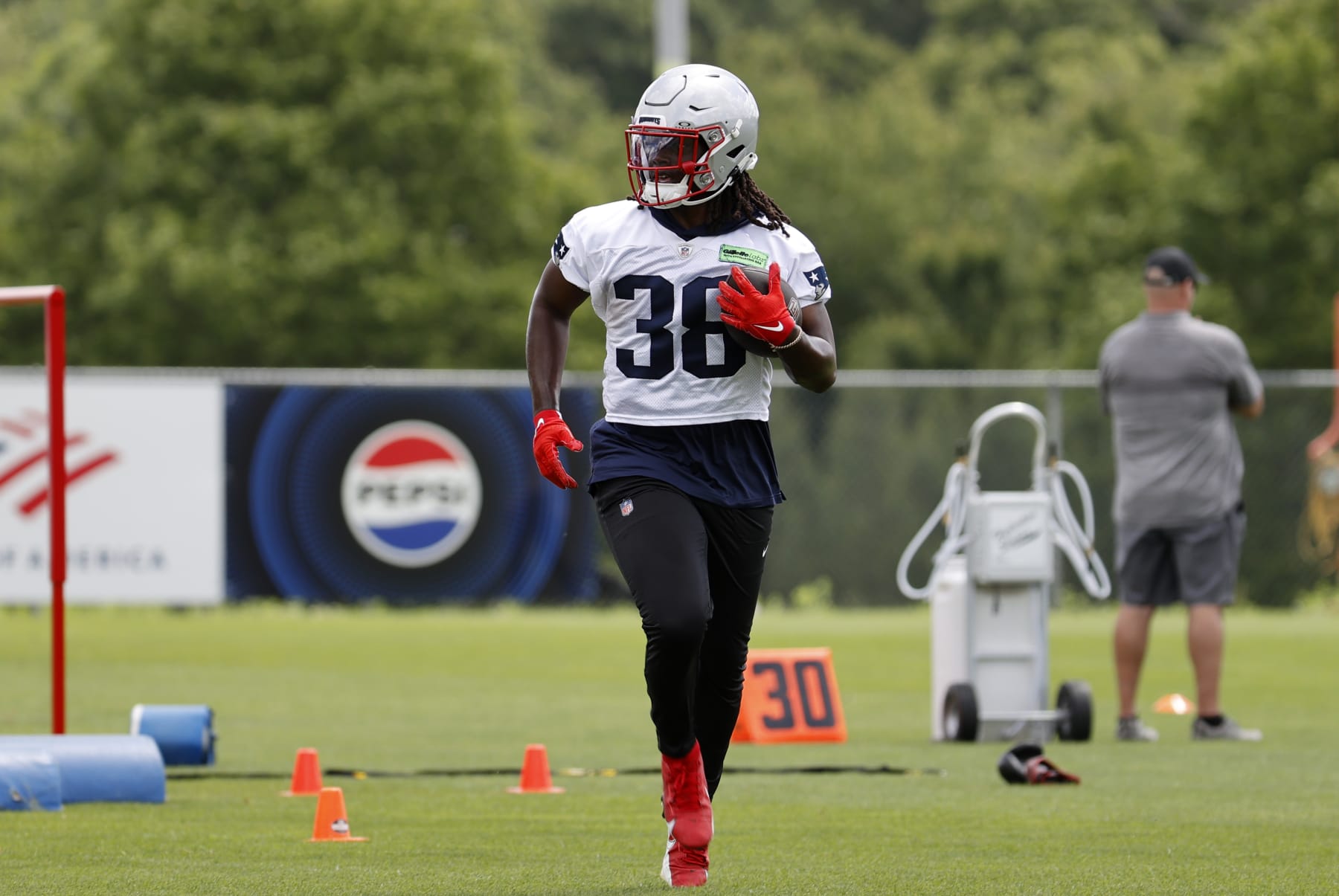 FOXBOROUGH, MA - JUNE 12: New England Patriots running back Rhamondre Stevenson (38) during New England Patriots Minicamp on June 12, 2024, at The Patriots practice facility at Gillette Stadium in Foxborough, Massachusetts. (Photo by Fred Kfoury III/Icon Sportswire via Getty Images)