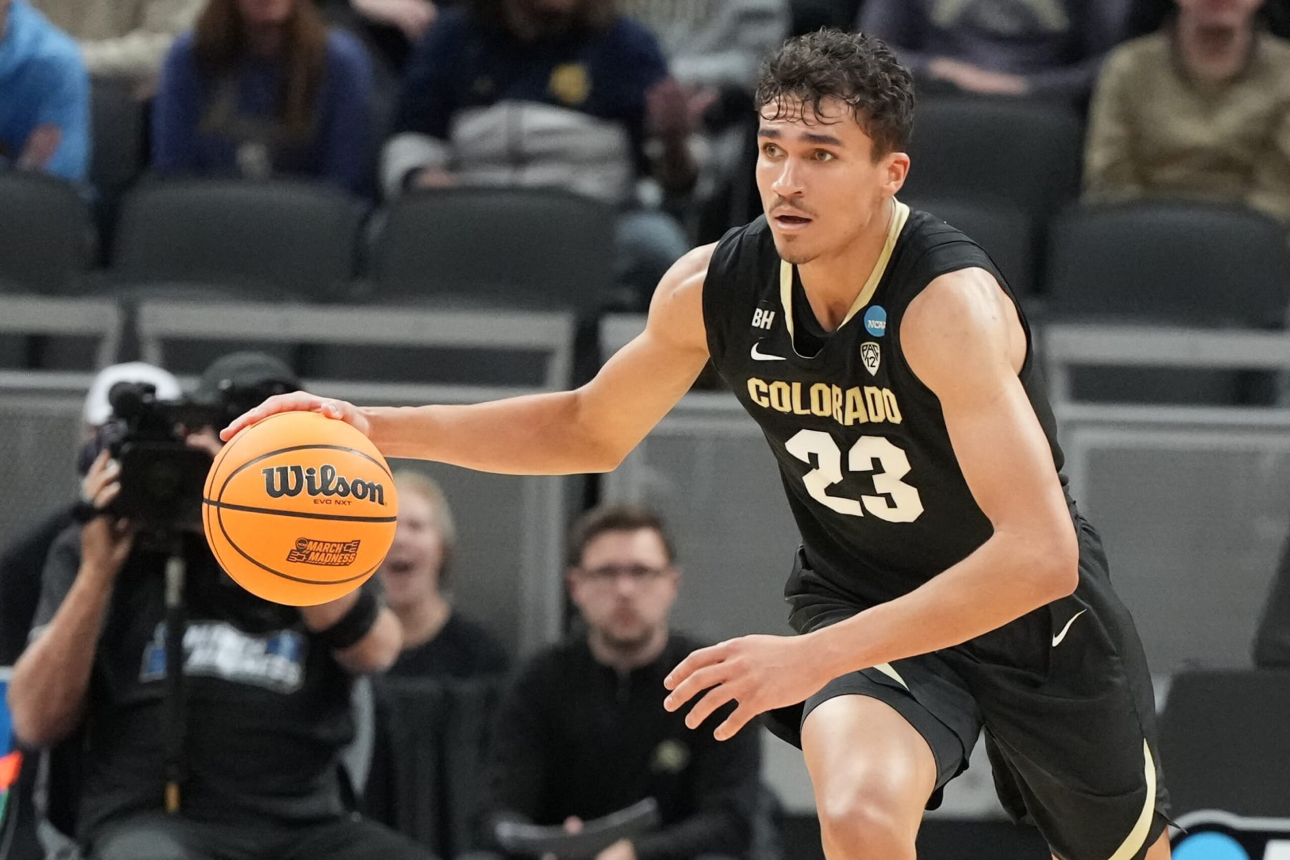 INDIANAPOLIS, INDIANA - MARCH 24: Tristan da Silva #23 of the Colorado Buffaloes dribbles the ball during the Second Round NCAA Men's Basketball Tournament game against the Marquette Golden Eagles at Gainbridge Fieldhouse on March 24, 2024 in Indianapolis, Indiana. (Photo by Mitchell Layton/Getty Images)