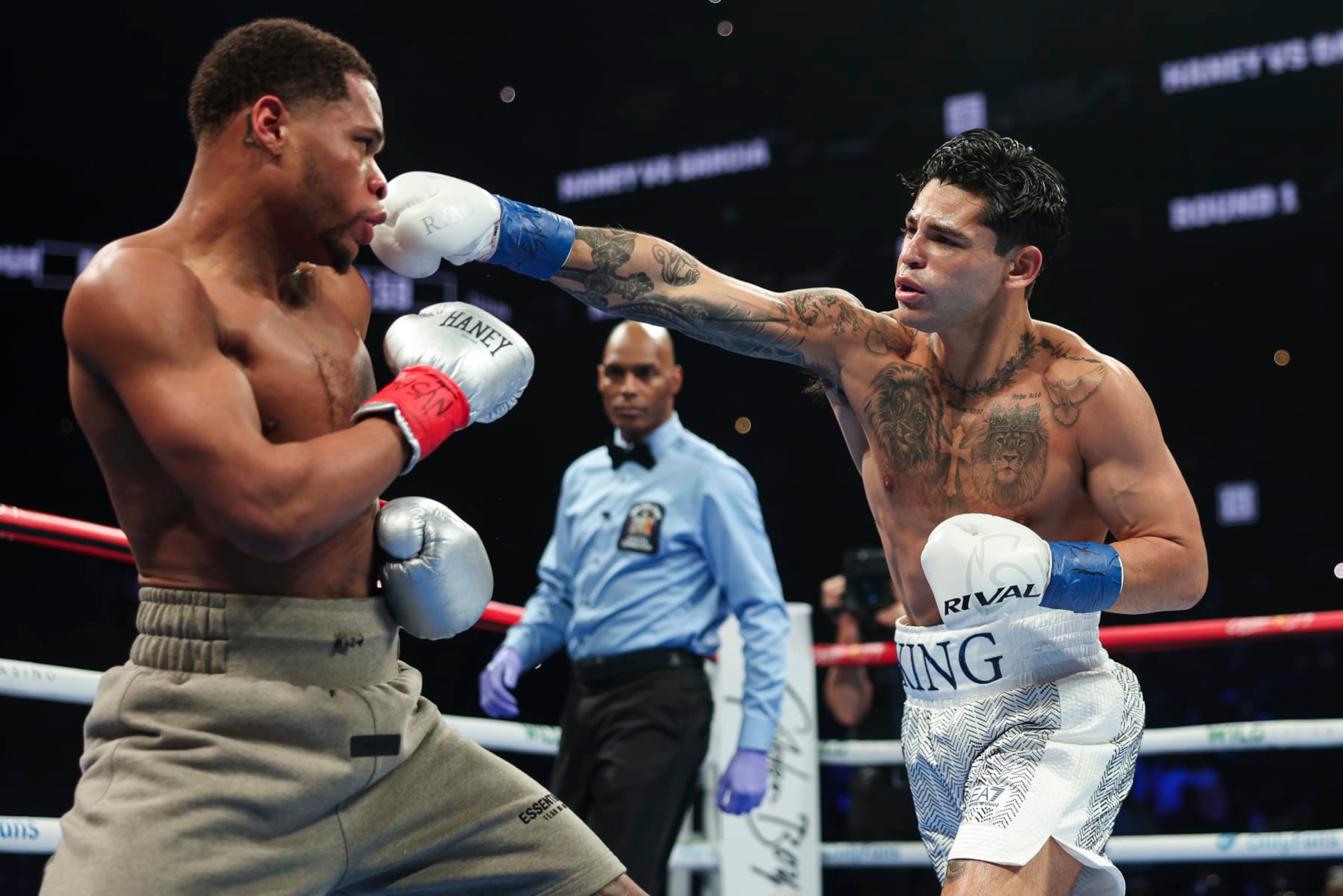 NEW YORK, NEW YORK - APRIL 20: Ryan Garcia throws a punch at Devin Haney during a fight at Barclays Center on April 20, 2024 in New York City.  (Photo by Cris Esqueda/Golden Boy/Getty Images)