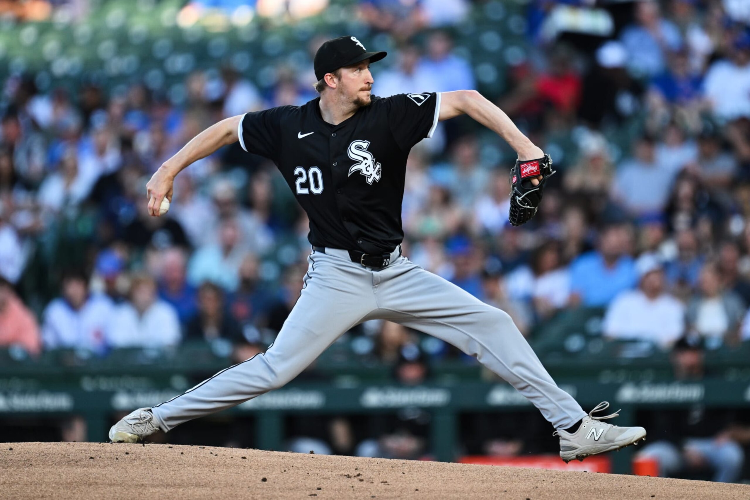 CHICAGO, IL - JUNE 05: Erick Fedde #20 of the Chicago White Sox pitches in the first inning against the Chicago Cubs at Wrigley Field on June 05, 2024 in Chicago, Illinois. (Photo by Jamie Sabau/Getty Images) CHICAGO, IL - JUNE 05: Erick Fedde #20 of the Chicago White Sox pitches in the first inning against the Chicago Cubs at Wrigley Field on June 05, 2024 in Chicago, Illinois. (Photo by Jamie Sabau/Getty Images)