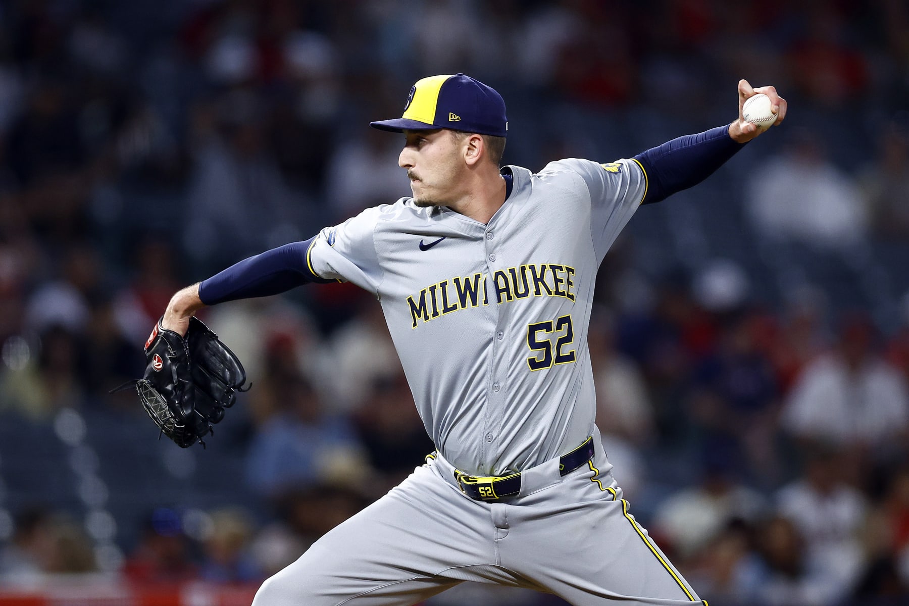 ANAHEIM, CALIFORNIA - JUNE 19:  Bryan Hudson #52 of the Milwaukee Brewers throws against the Los Angeles Angels in the seventh inning at Angel Stadium of Anaheim on June 19, 2024 in Anaheim, California.   (Photo by Ronald Martinez/Getty Images)